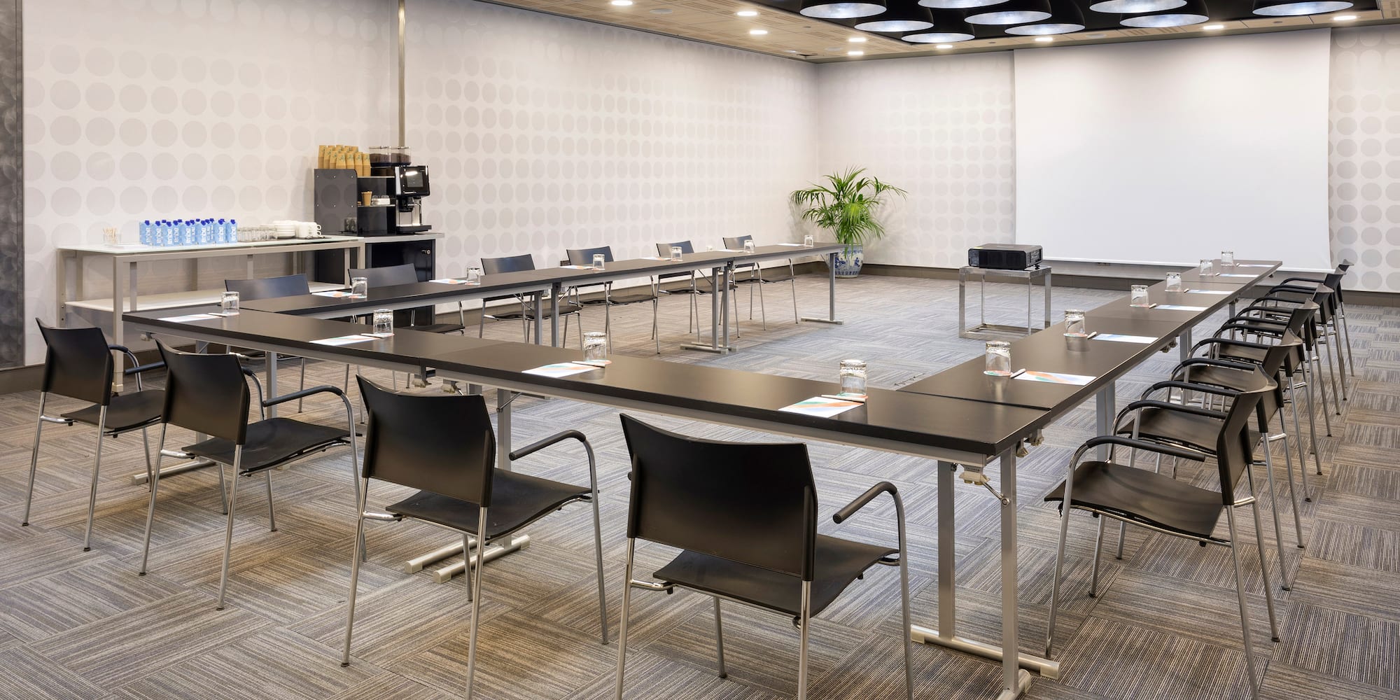 a room with tables and chairs