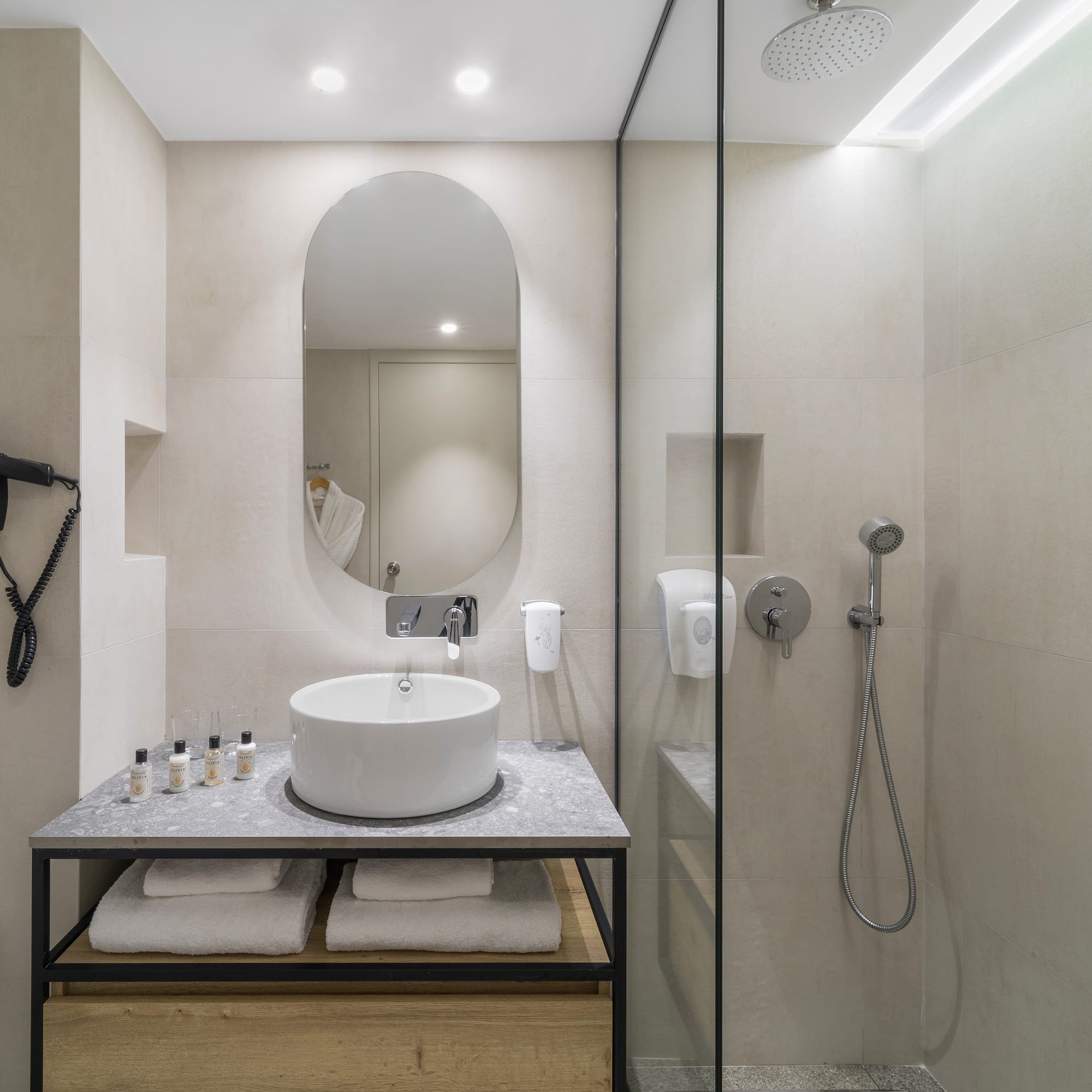 a bathroom with a sink and shower