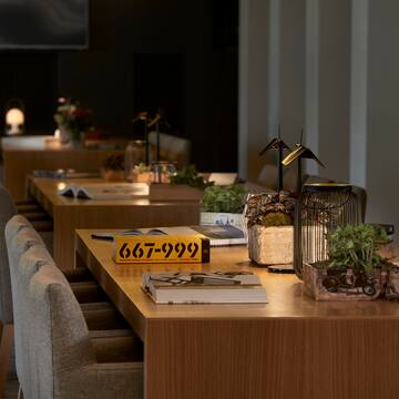 a table with plants and books