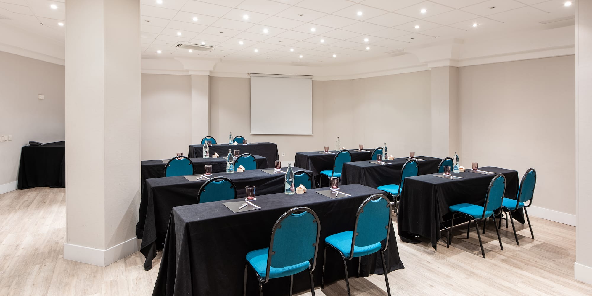 a room with tables and chairs