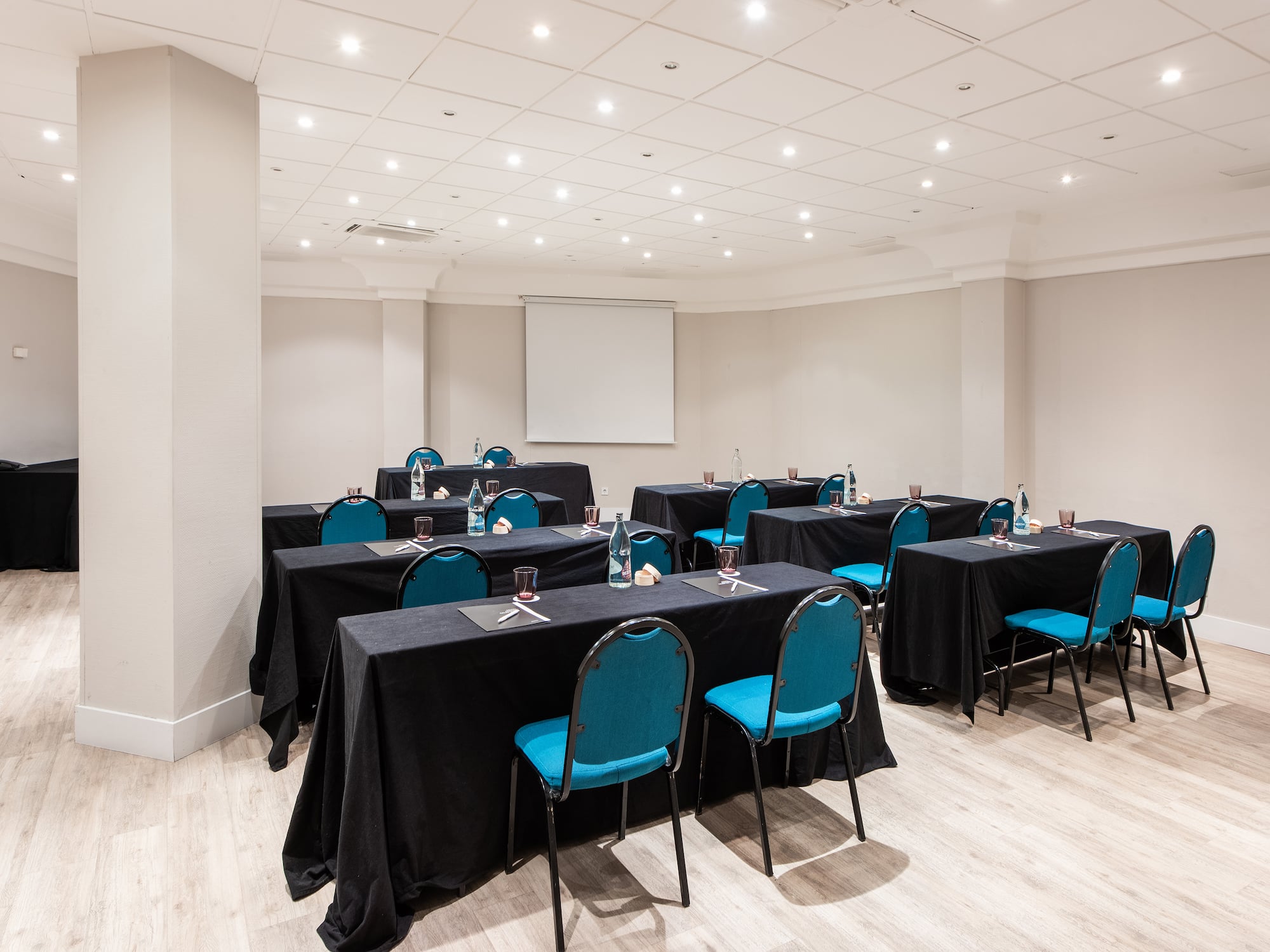 a room with tables and chairs