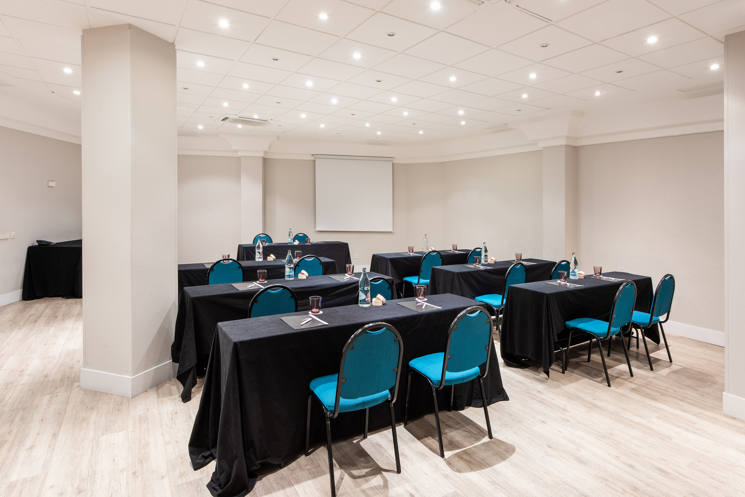 a room with tables and chairs