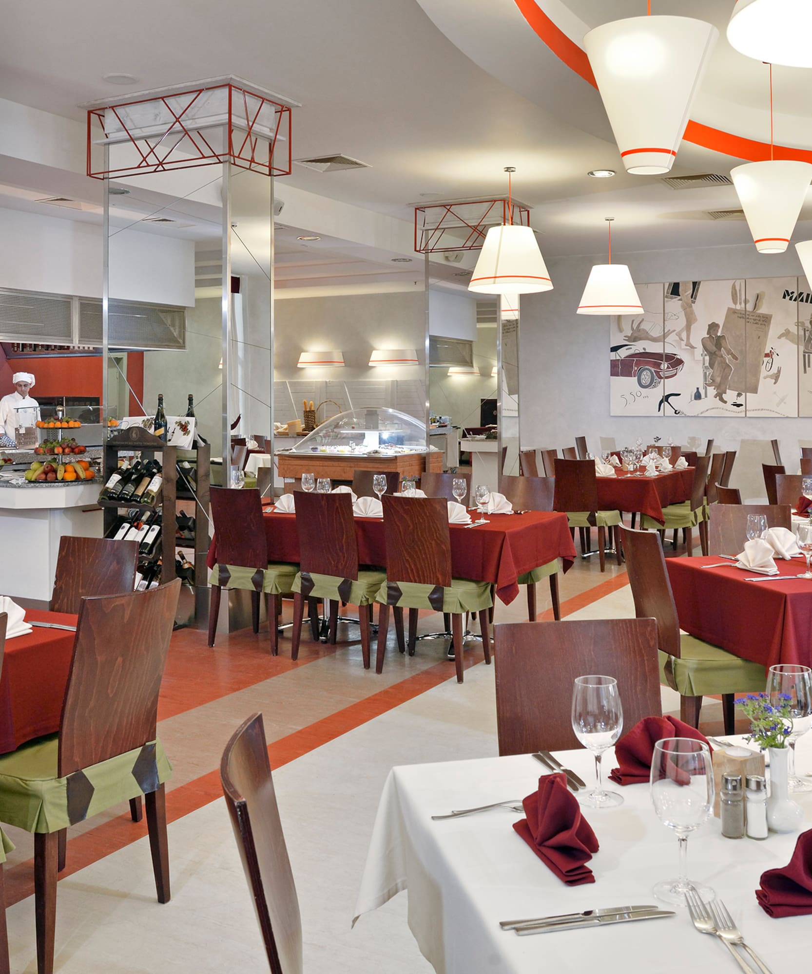 a restaurant with tables and chairs