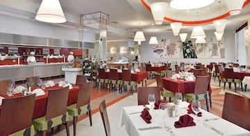 a restaurant with tables and chairs