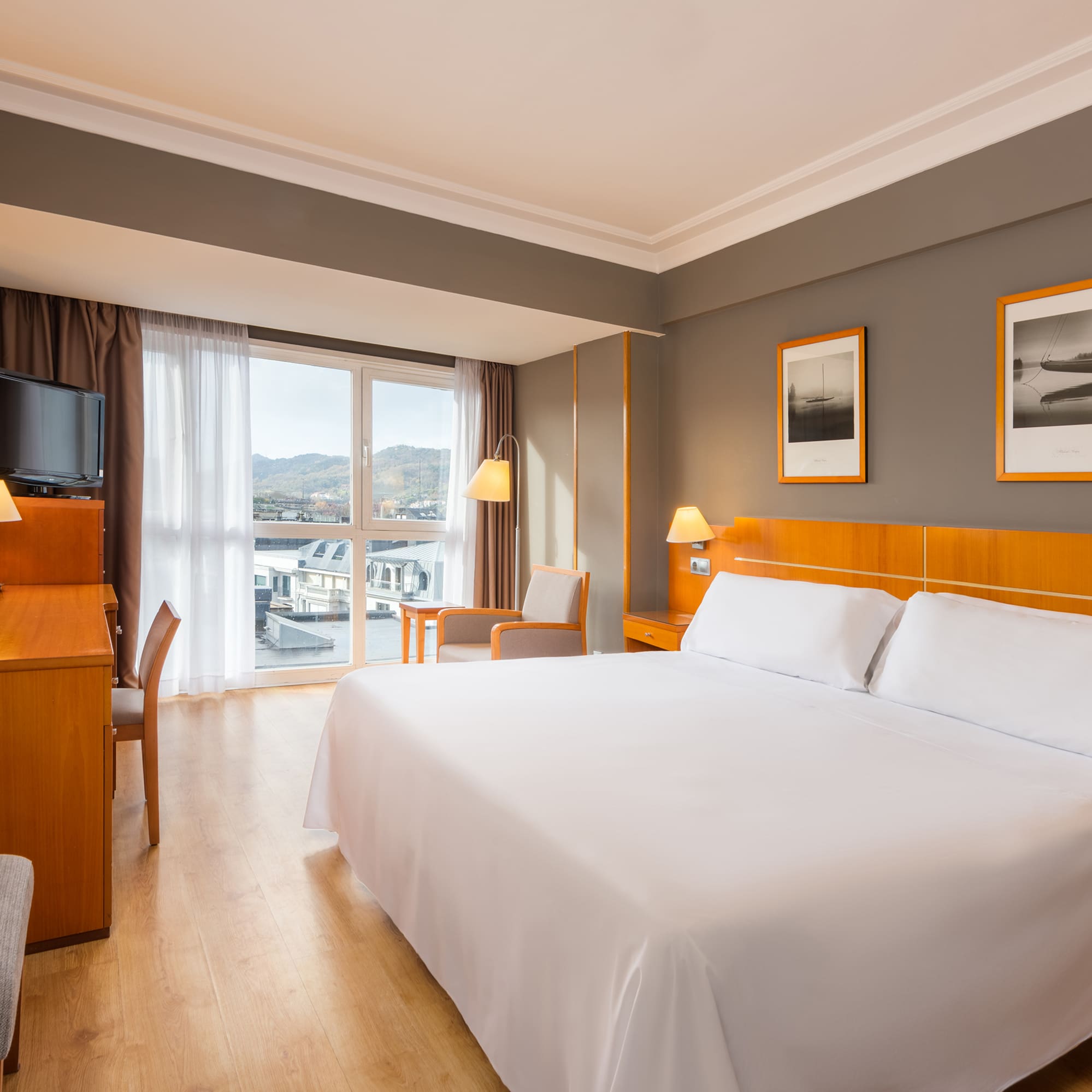 a room with a bed and a desk