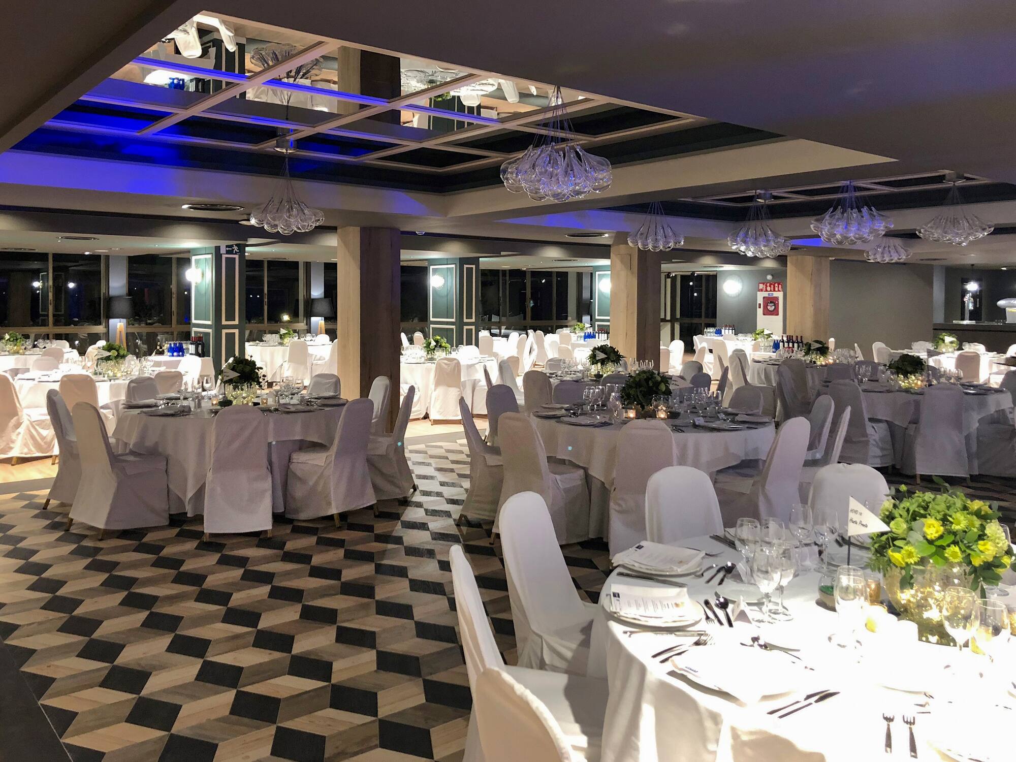 a room with tables and chairs