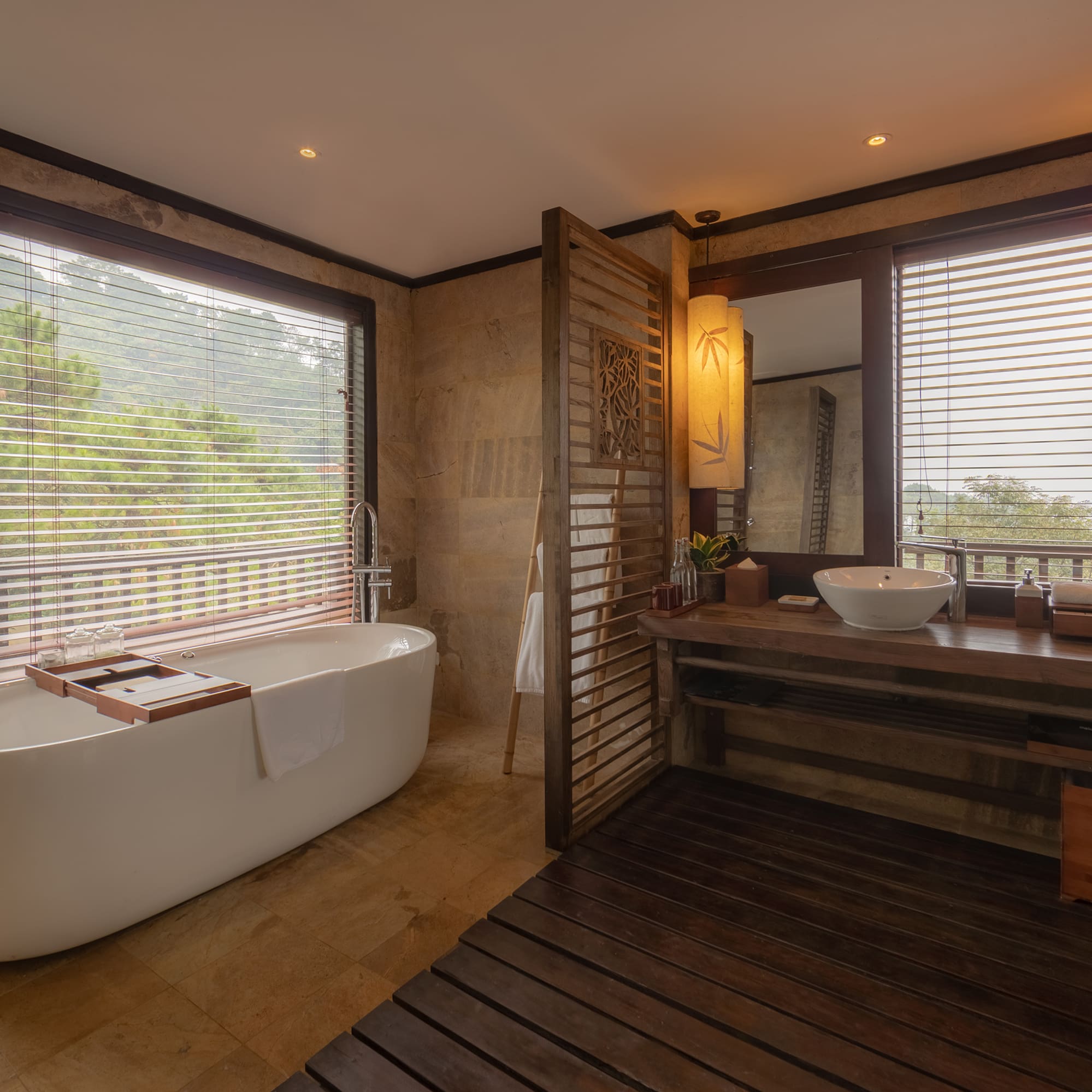 a bathroom with a tub and sink
