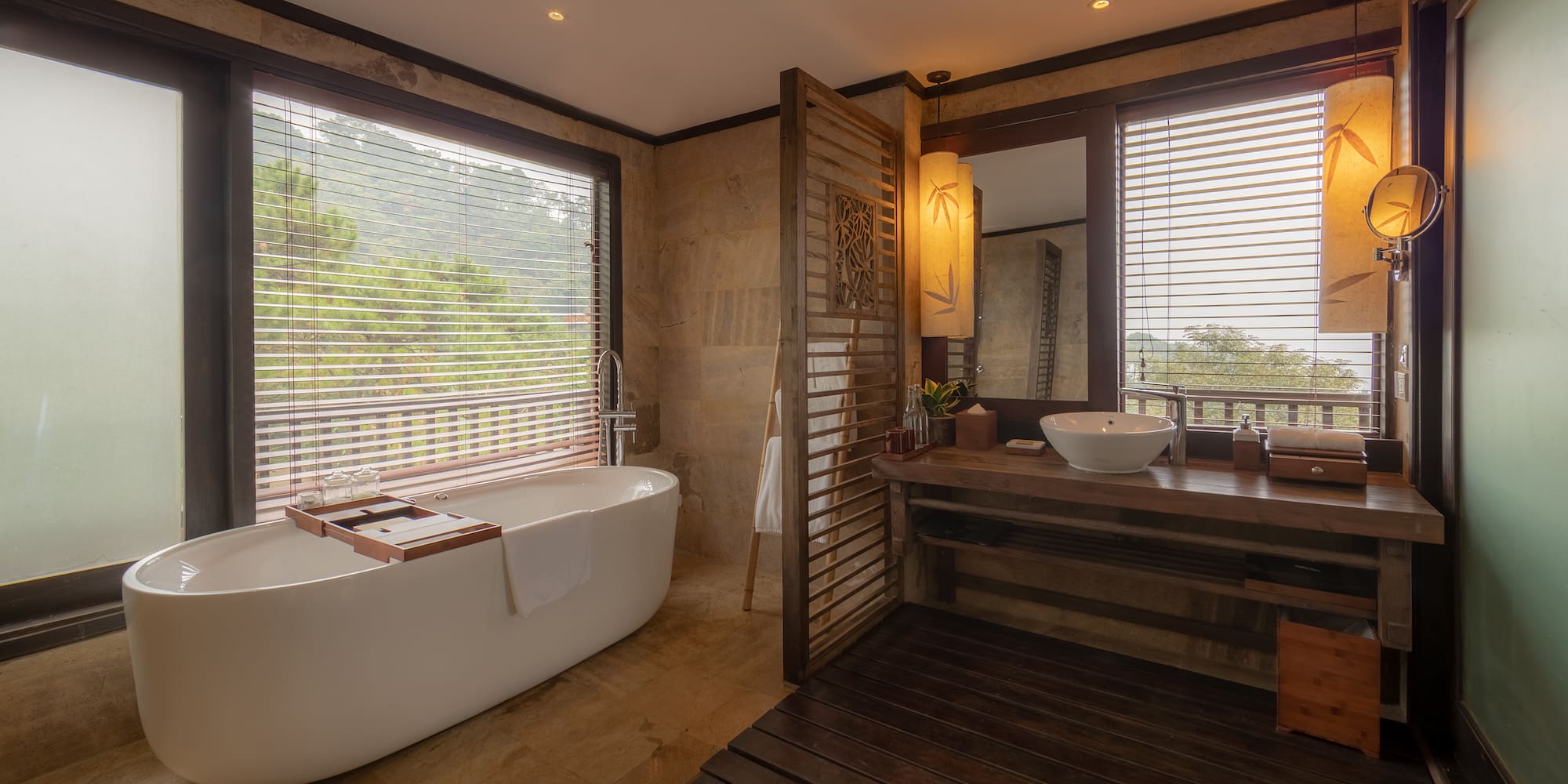 a bathroom with a tub and sink