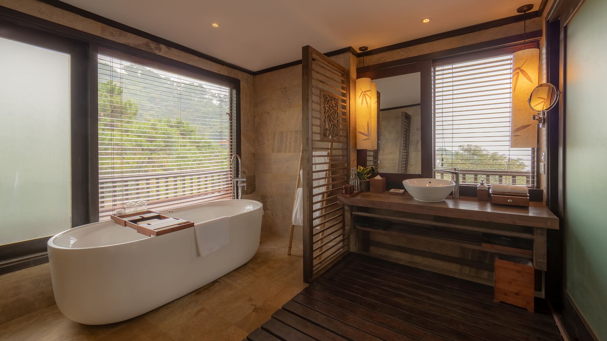 a bathroom with a tub and sink
