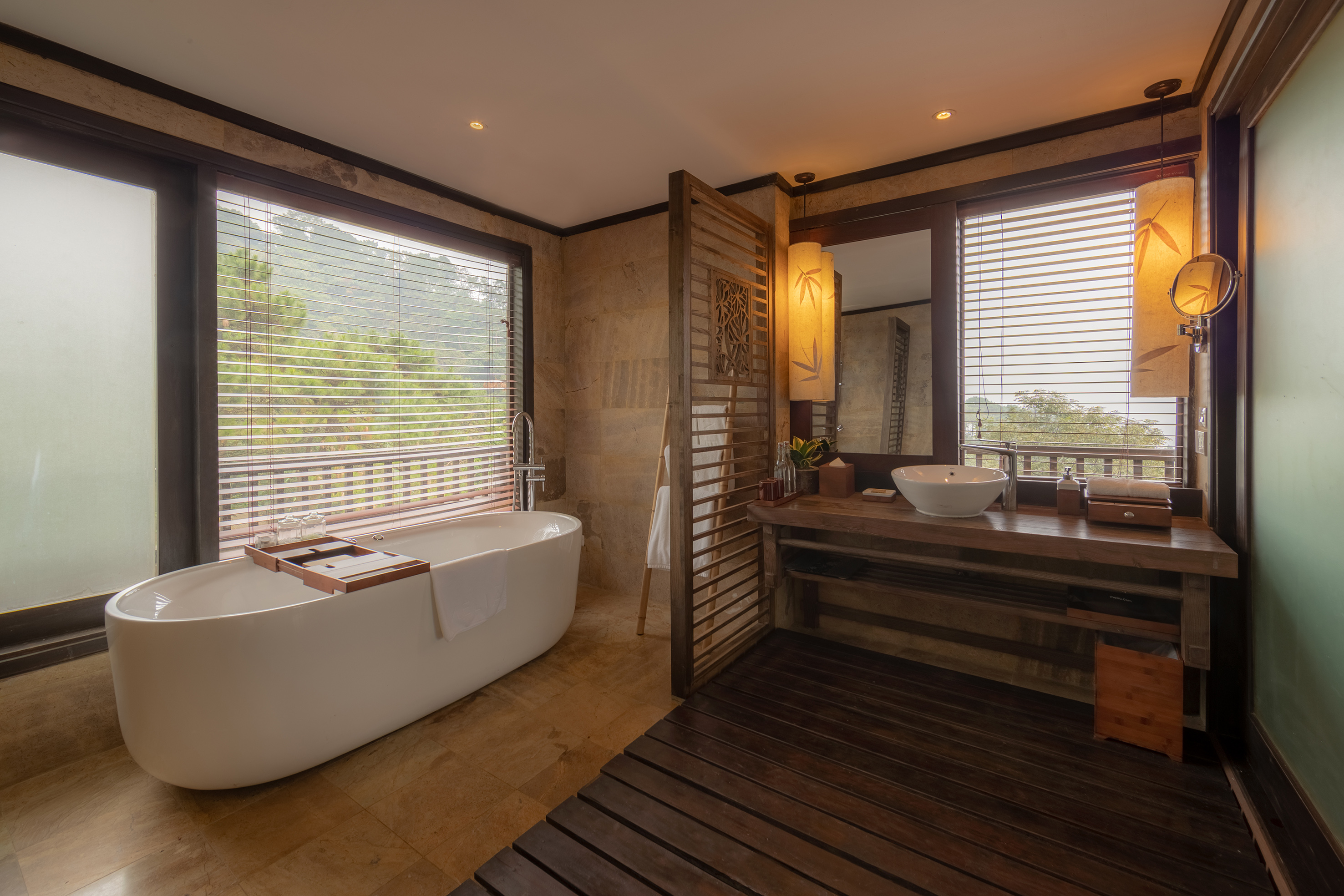 a bathroom with a tub and sink