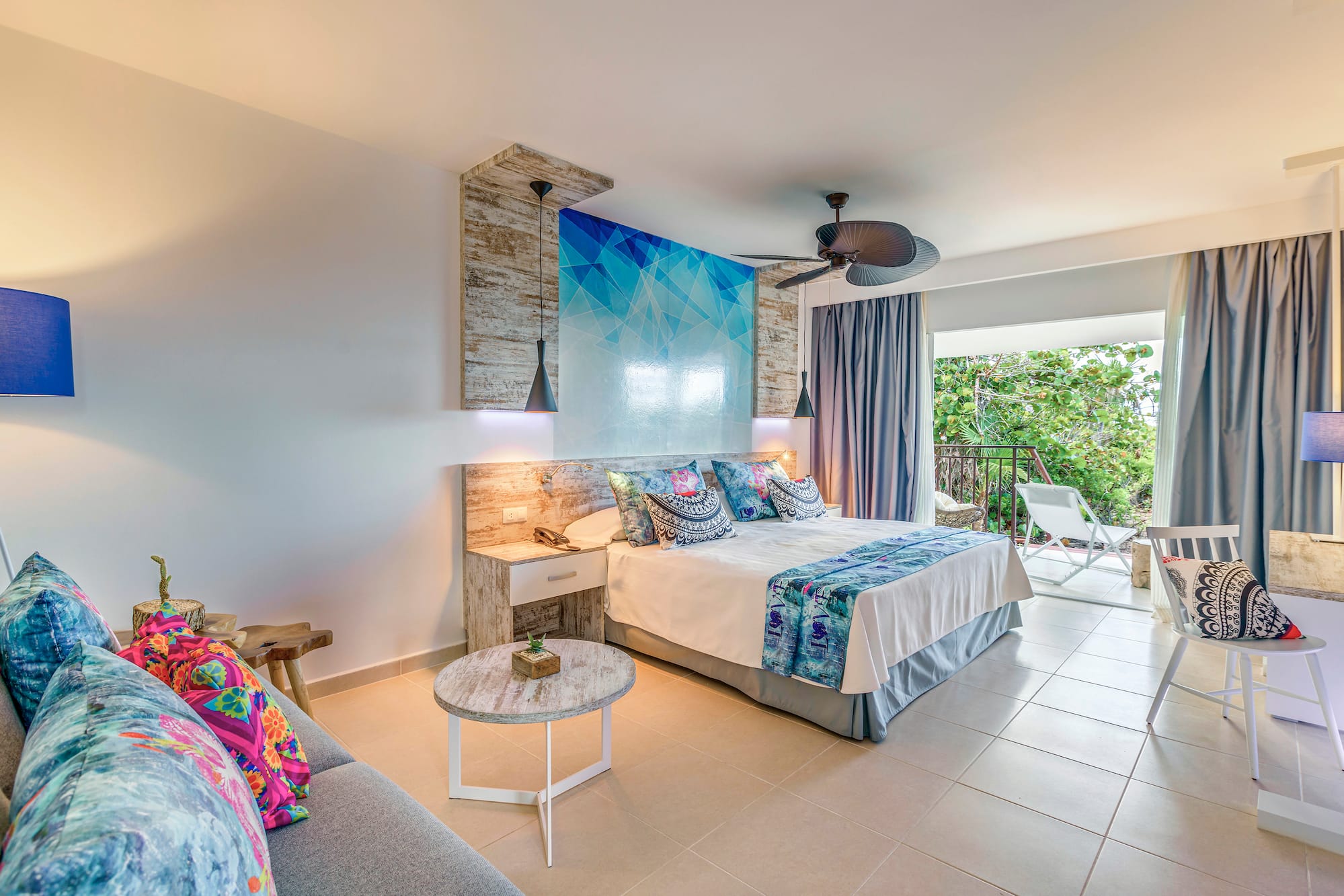 a bedroom with a bed and a couch