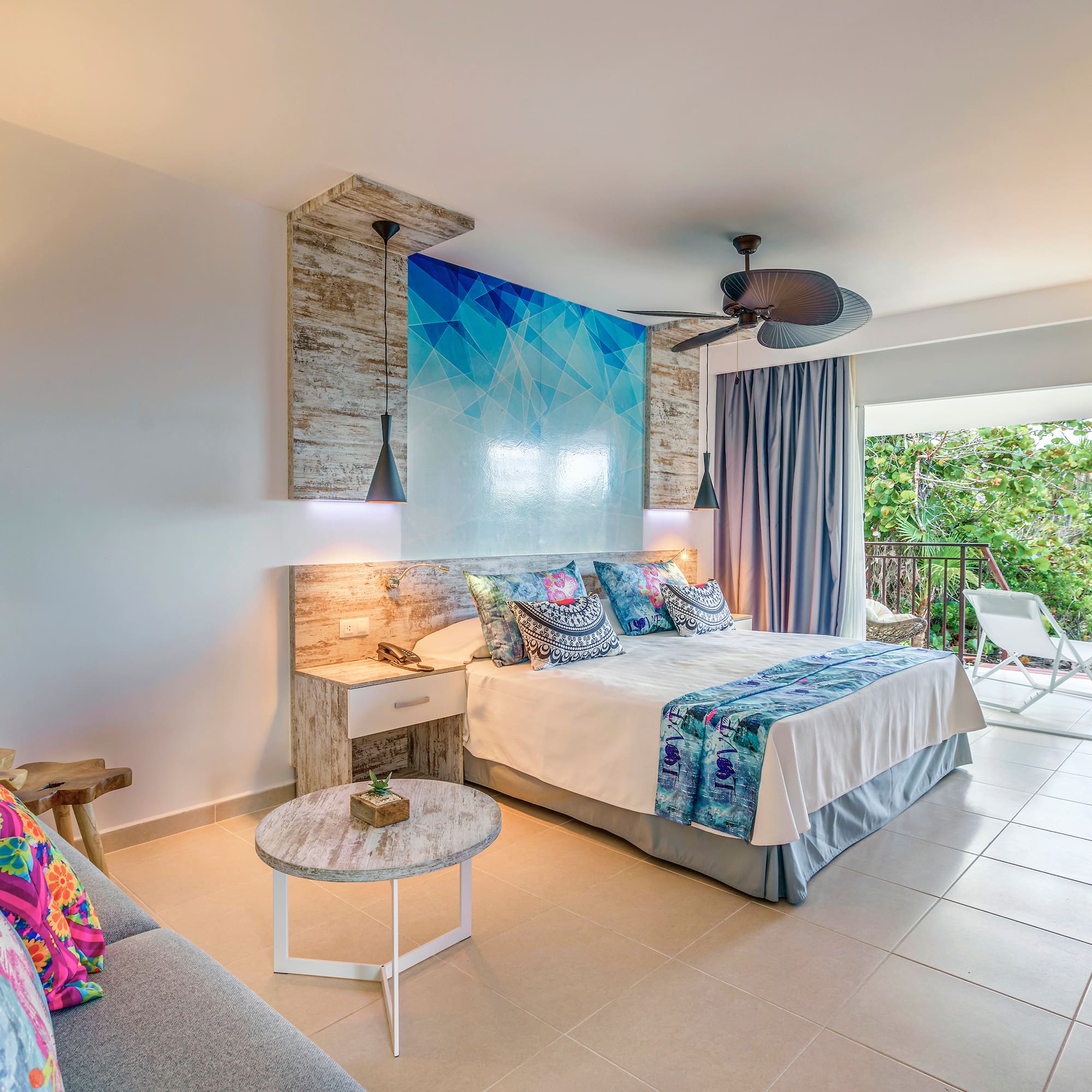 a bedroom with a bed and a couch