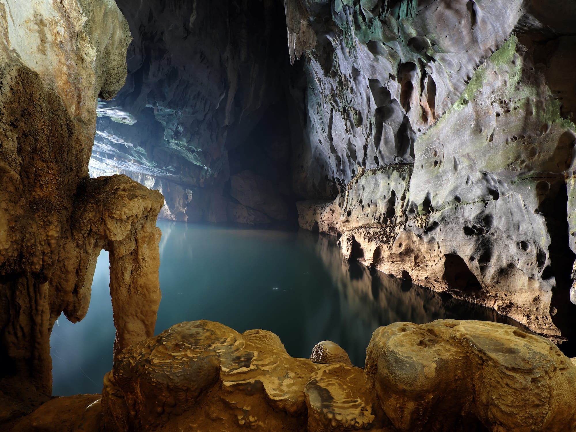 a cave with a body of water