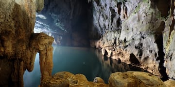 a cave with a body of water