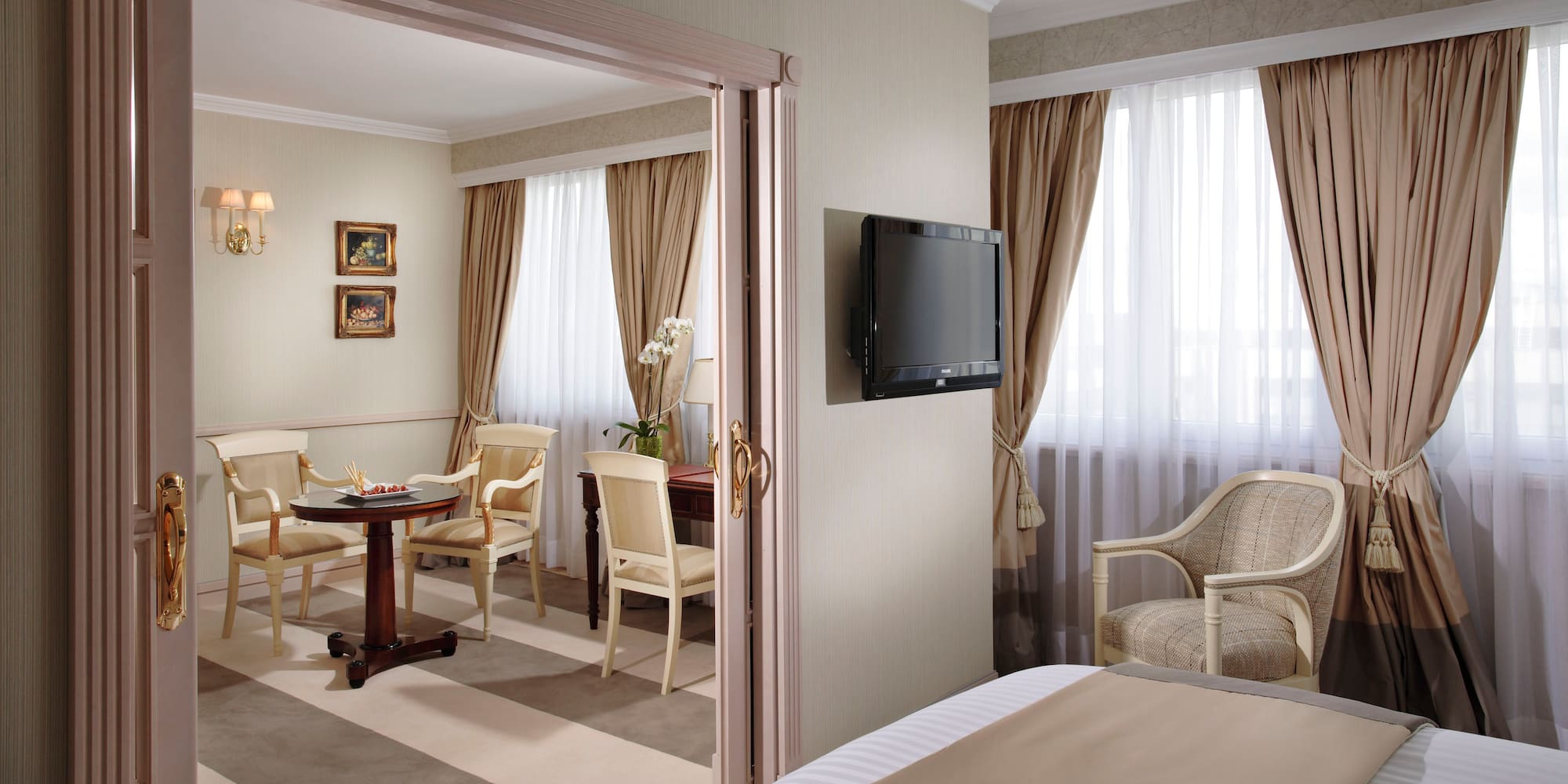 a room with a tv and a table