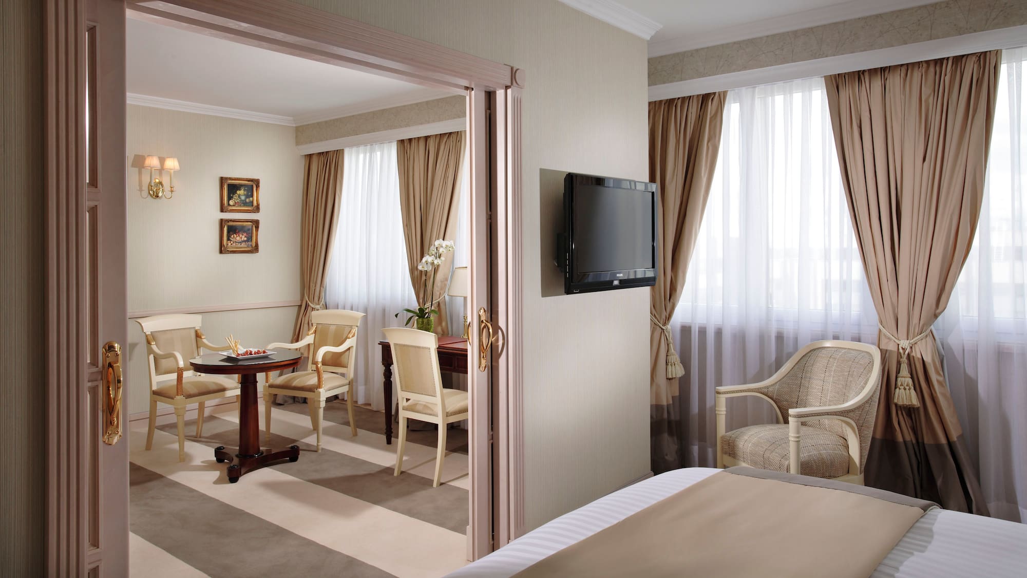 a room with a tv and a table