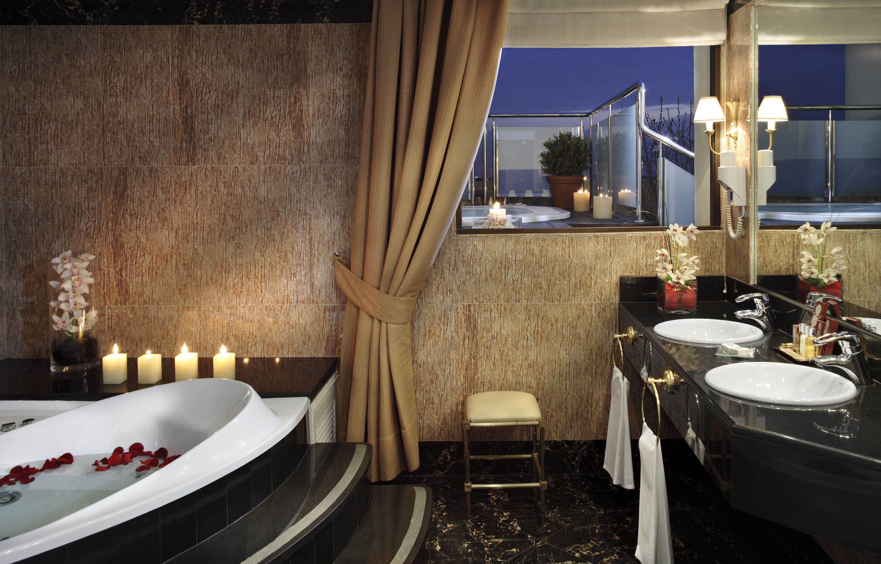 a bathroom with a tub and sink