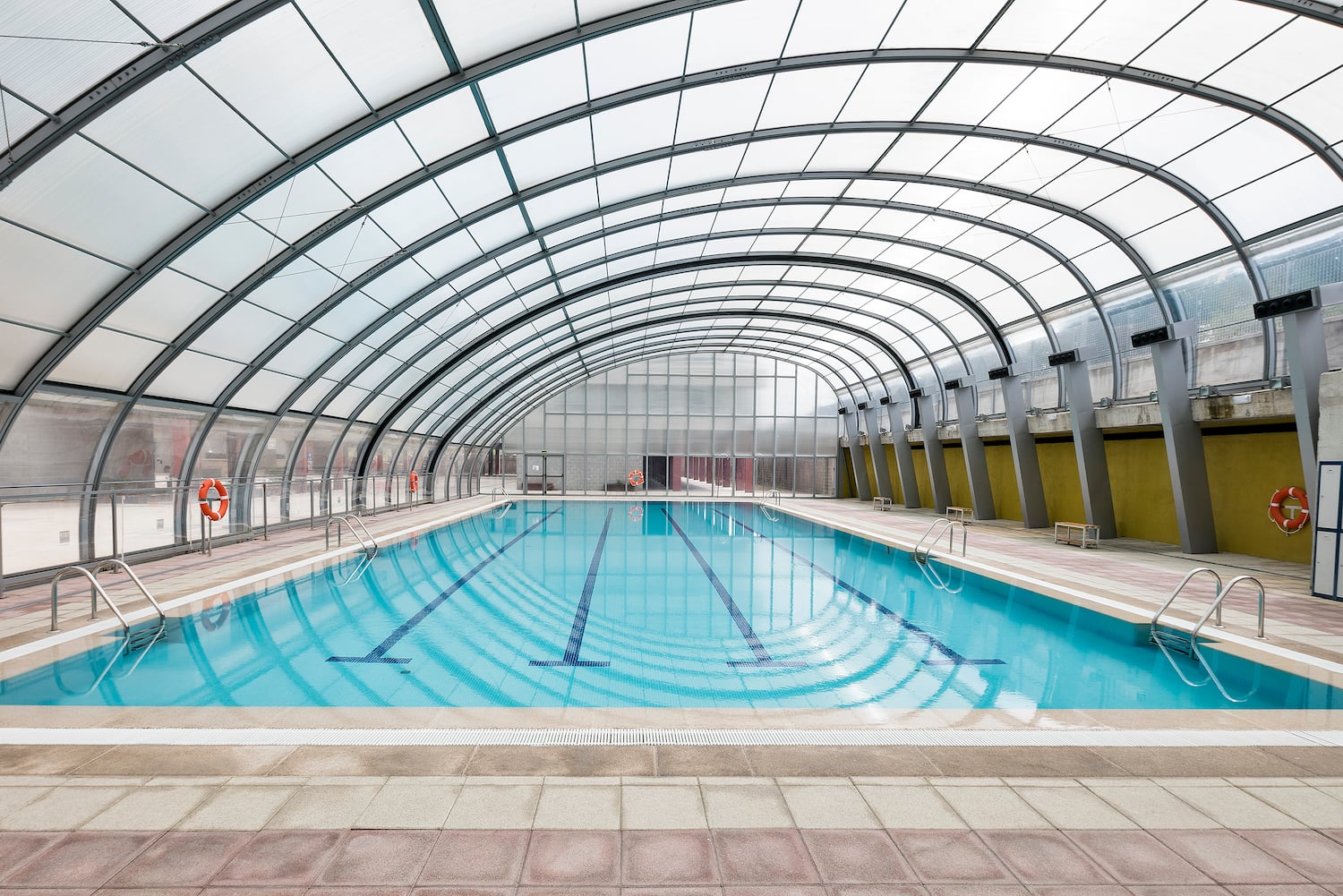 a swimming pool inside a building