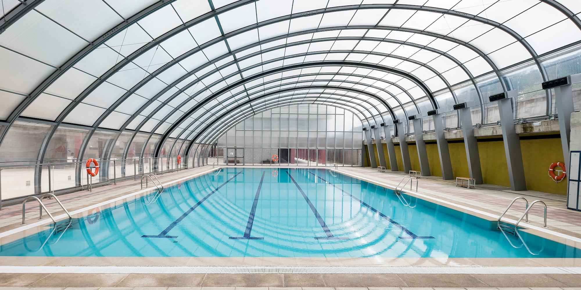 a swimming pool inside a building