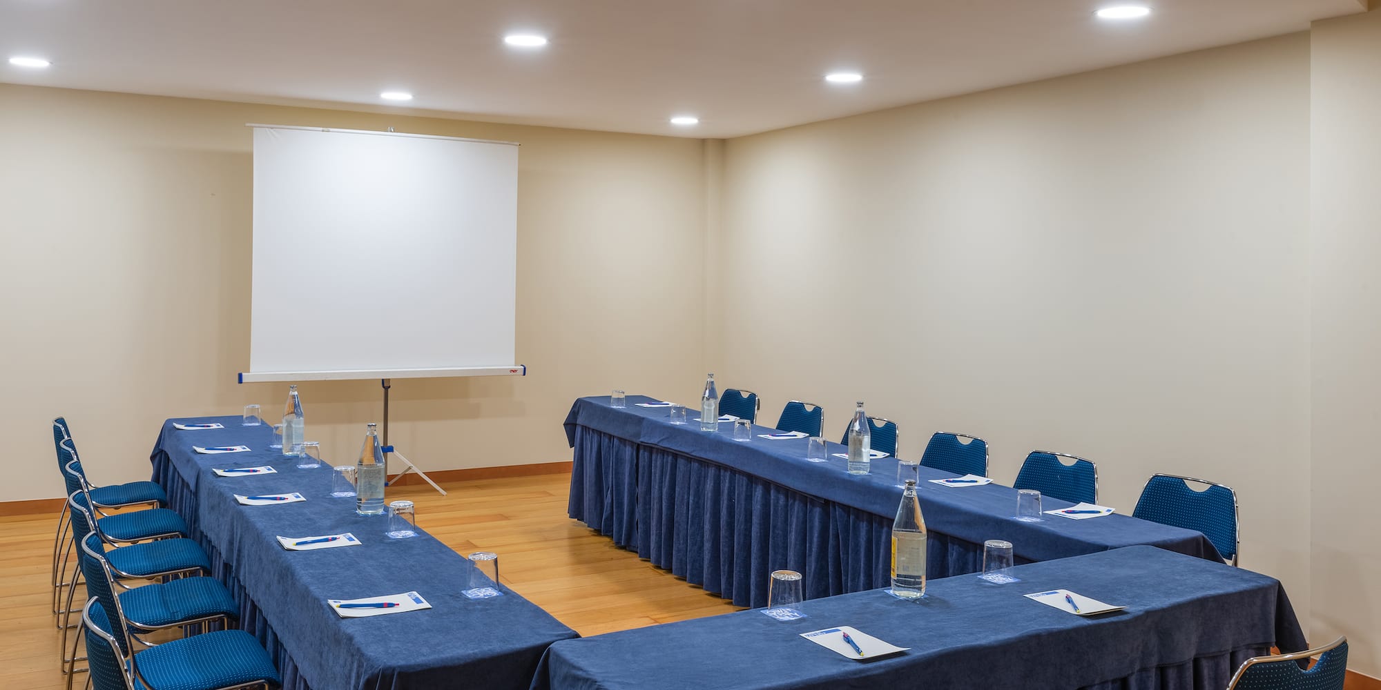 a room with tables and chairs