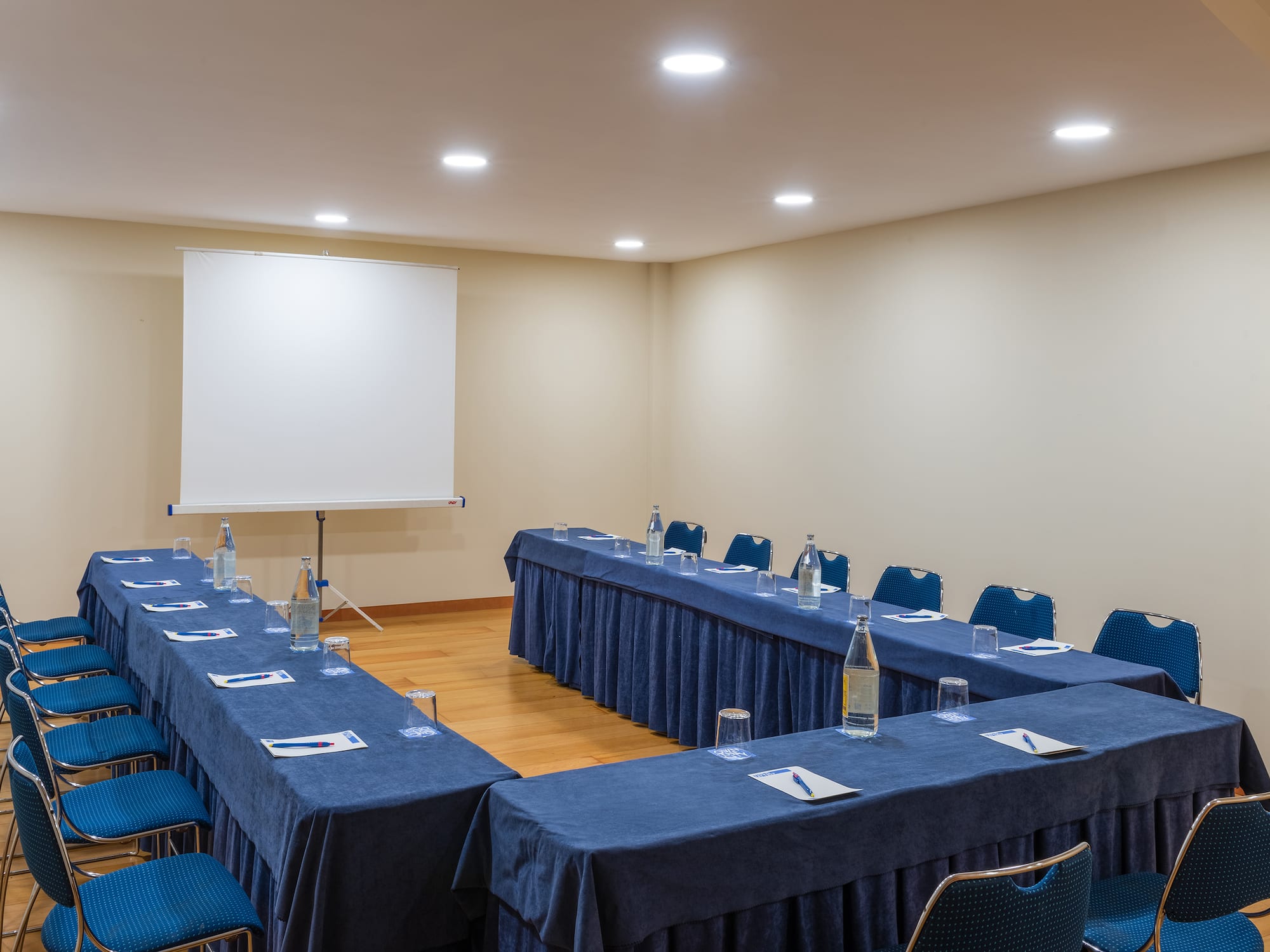 a room with tables and chairs