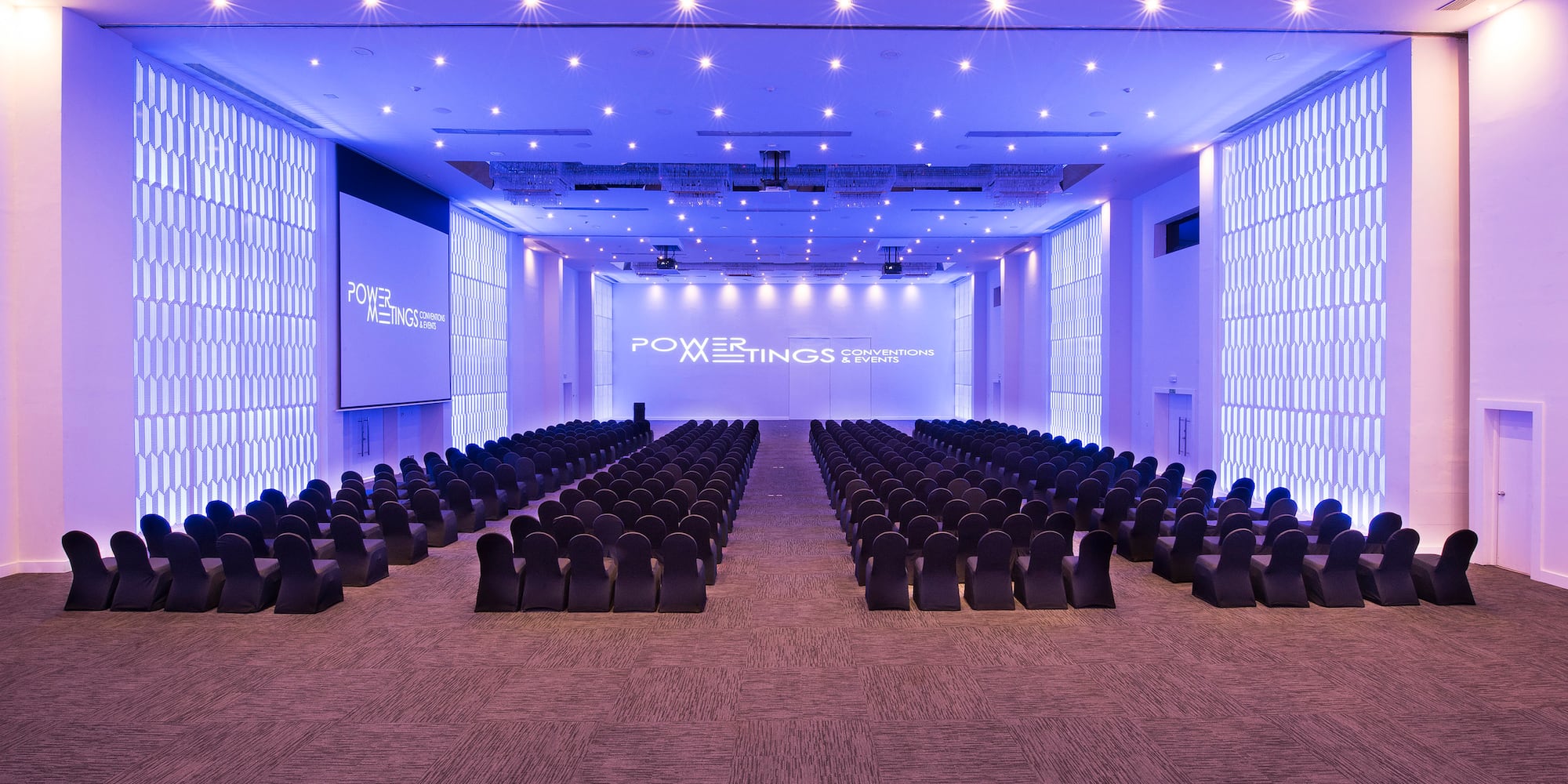 a large room with rows of chairs