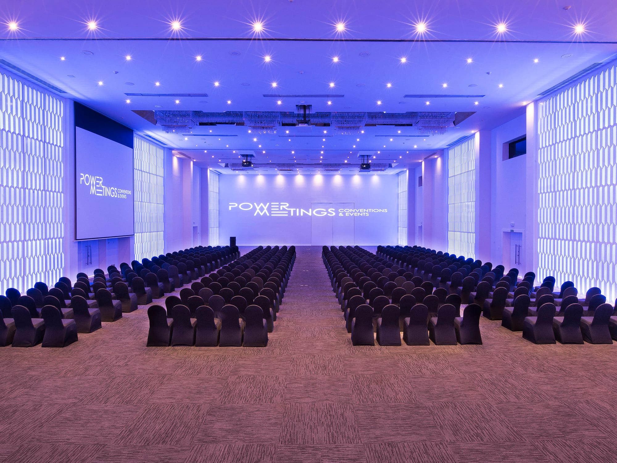 a large room with rows of chairs