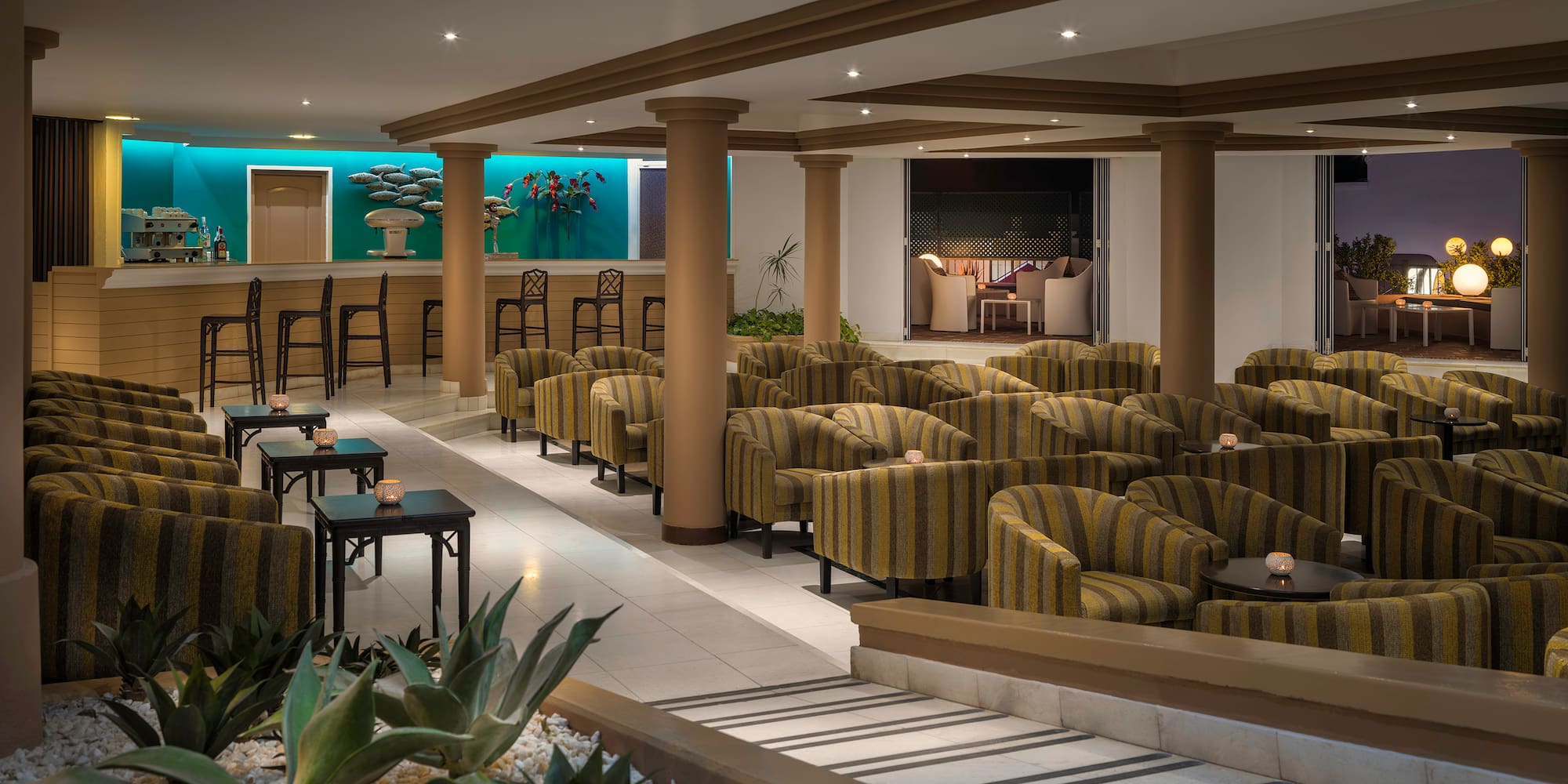 a room with chairs and tables