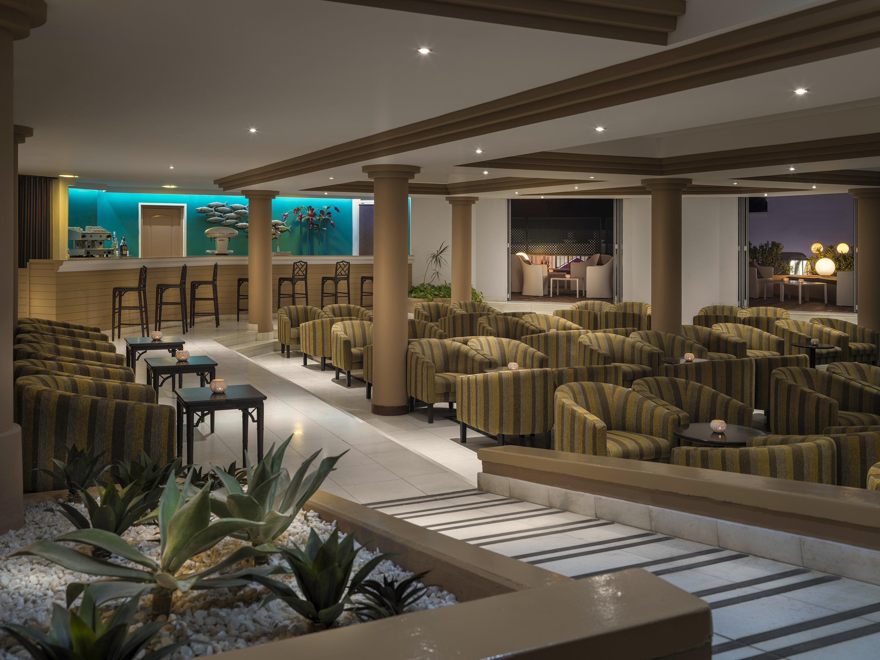 a room with chairs and tables