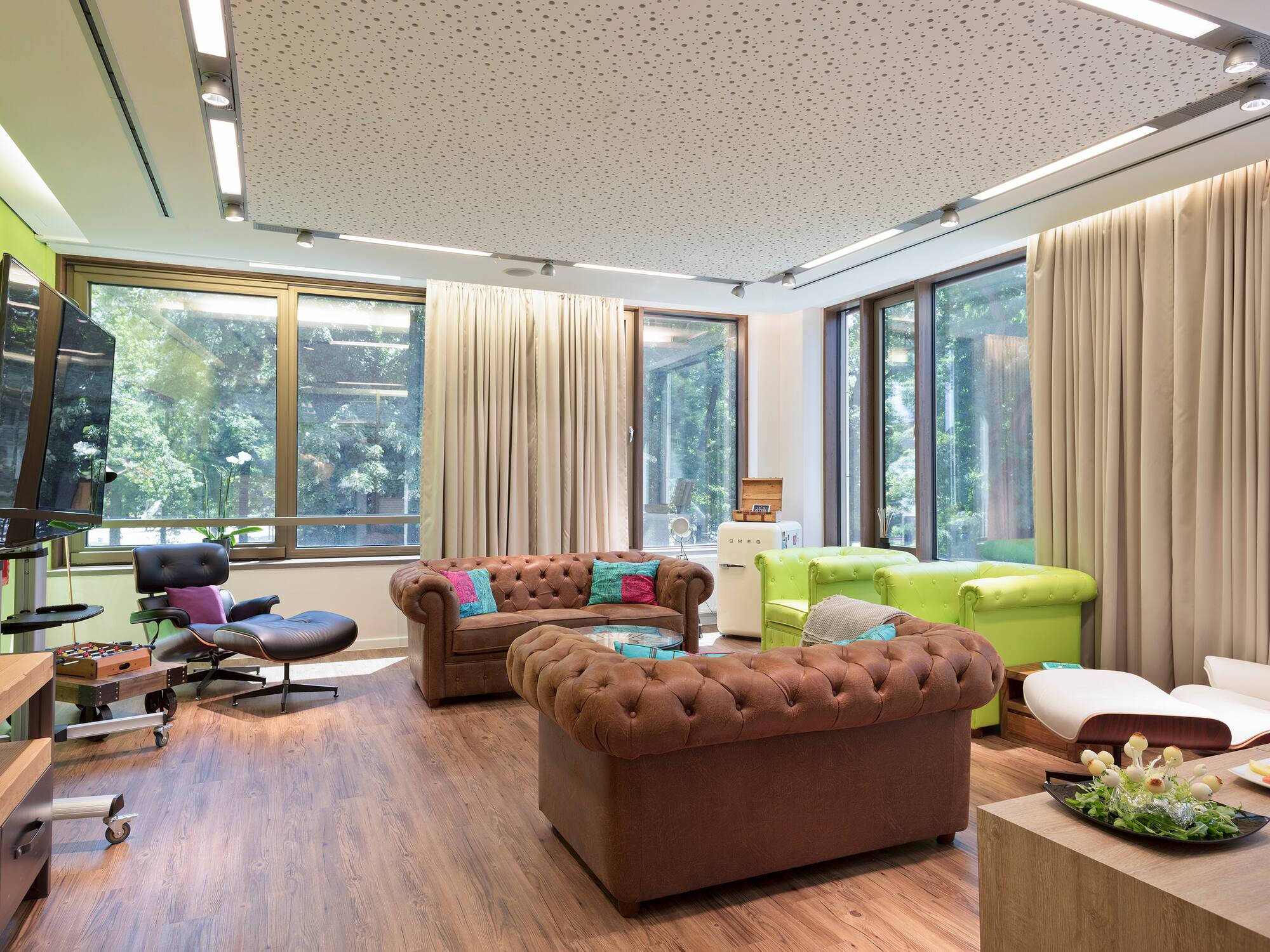 a room with couches and chairs