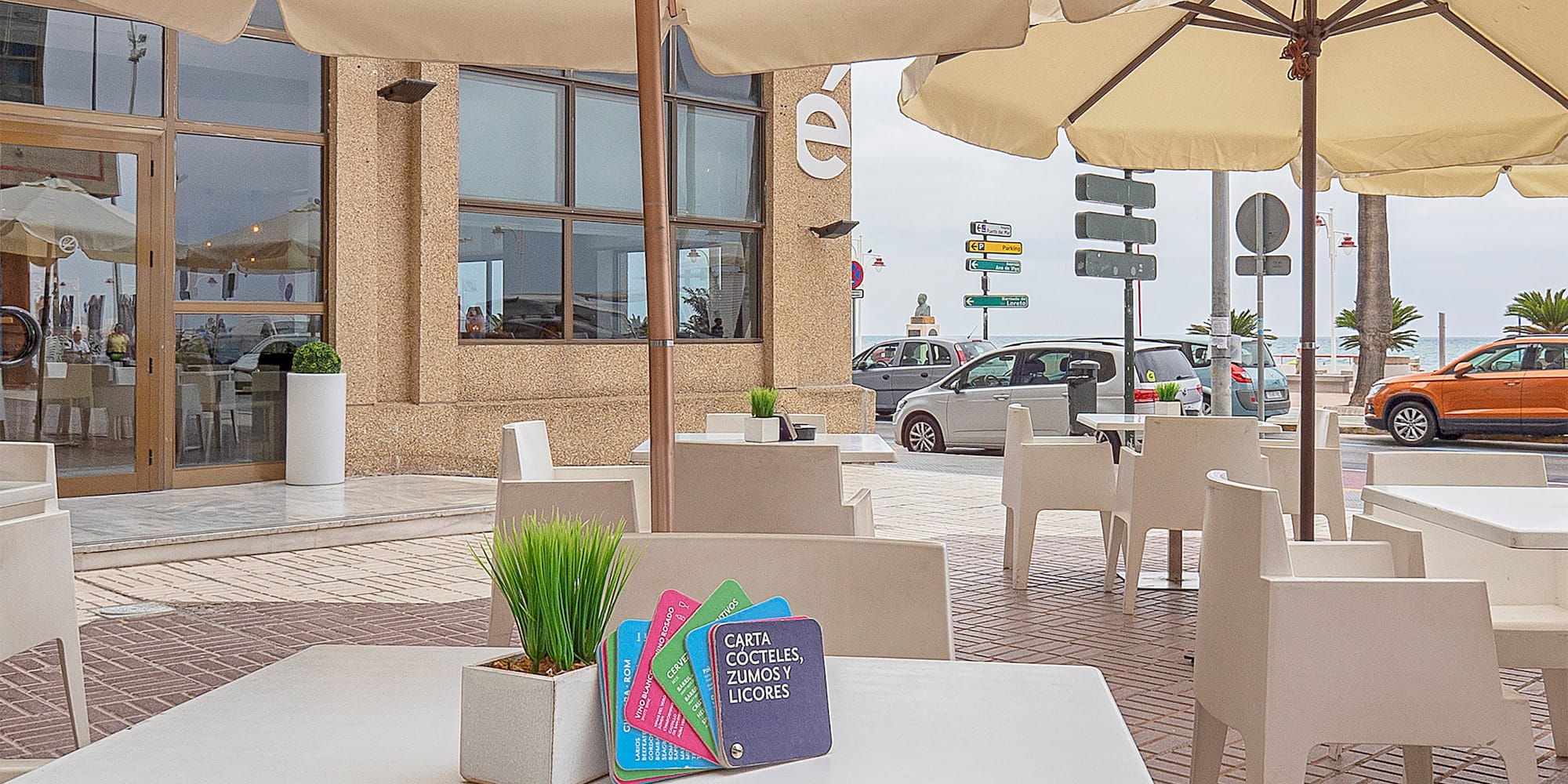 a table and chairs outside of a building