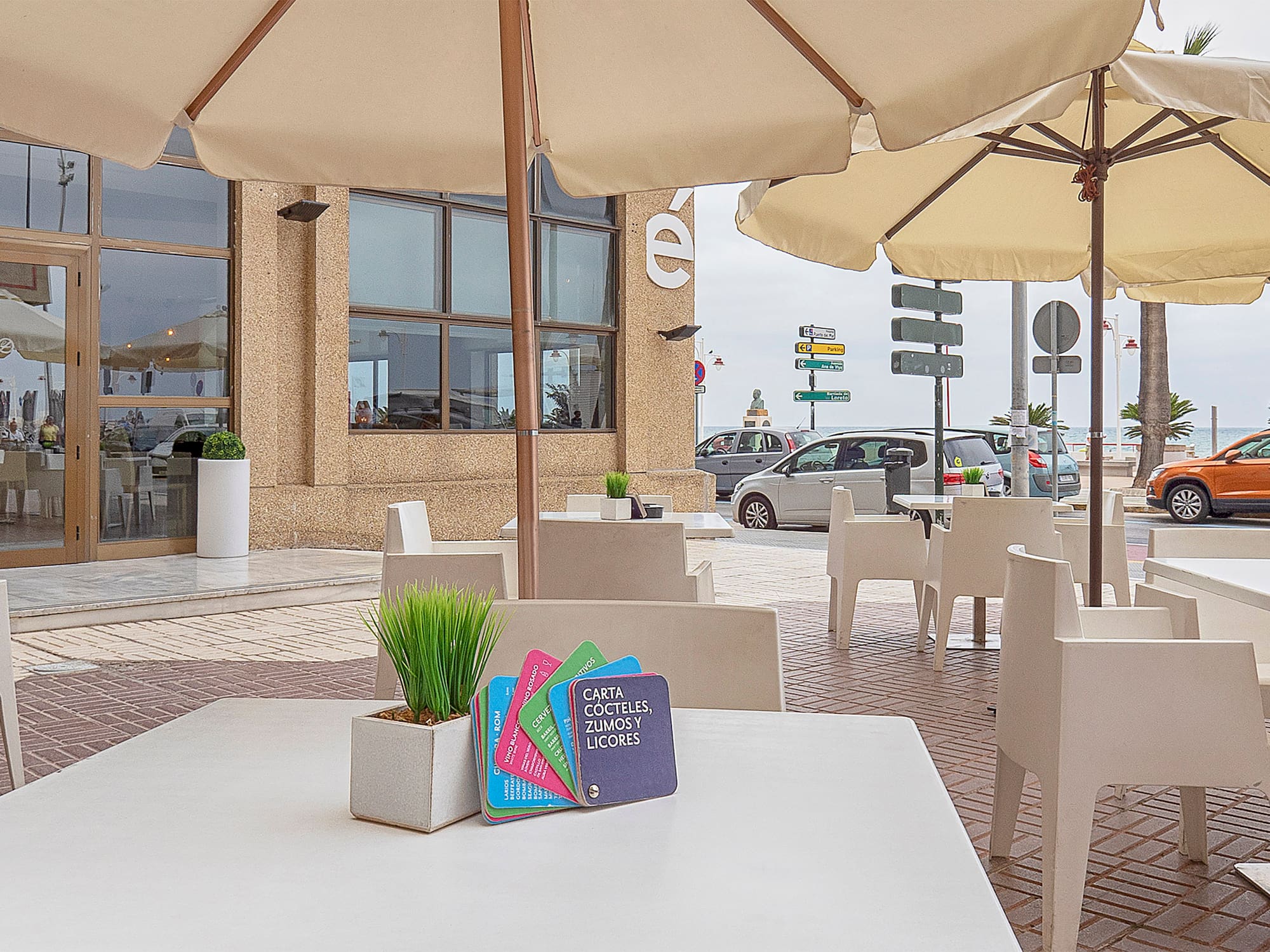 a table and chairs outside of a building