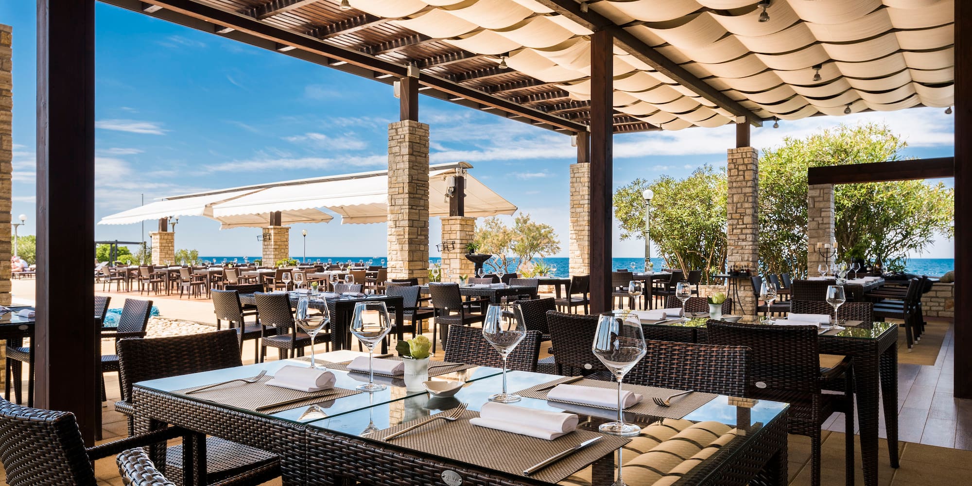 a restaurant with tables and chairs