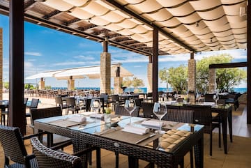 a restaurant with tables and chairs