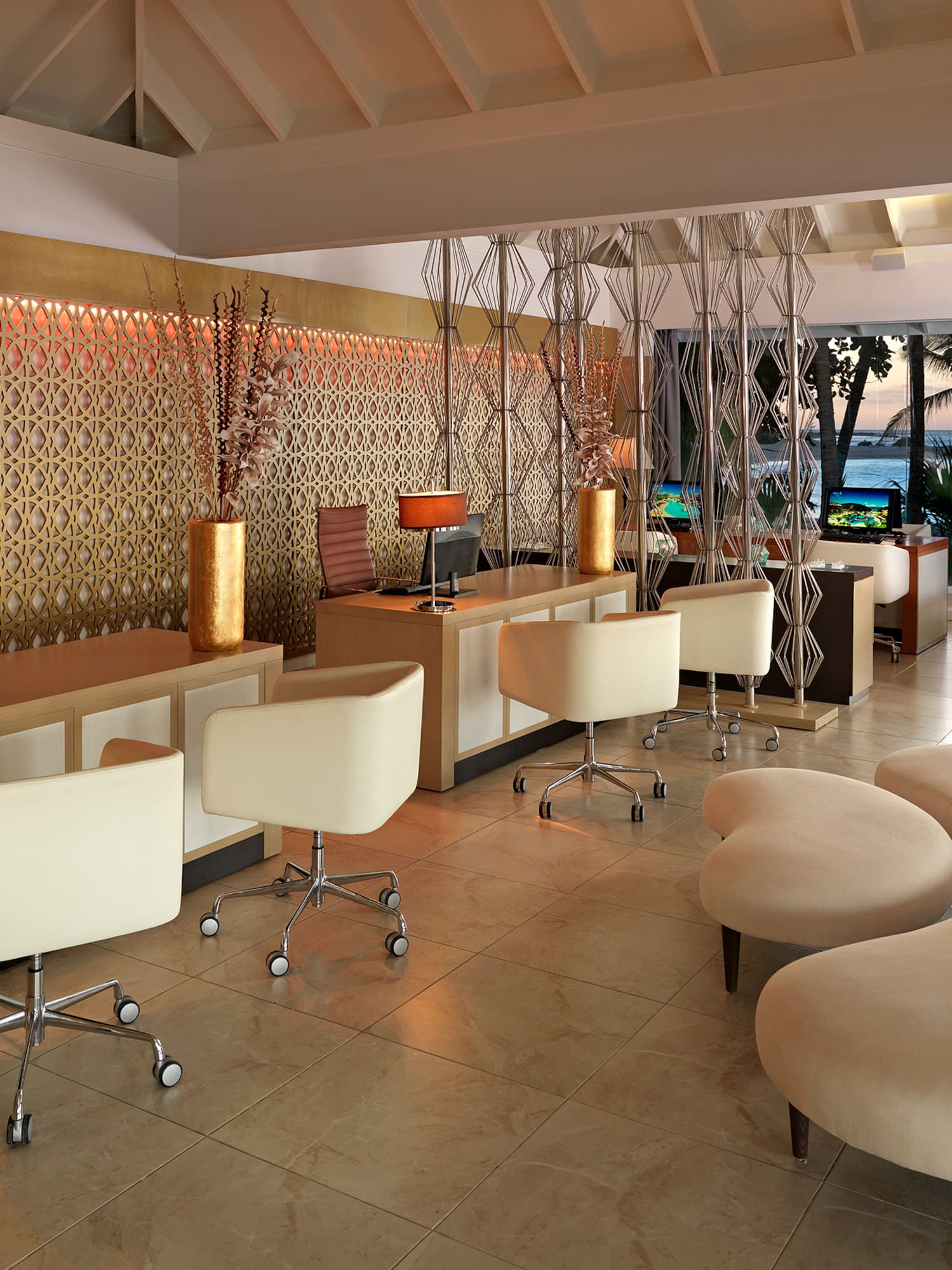 a room with a computer and a couch