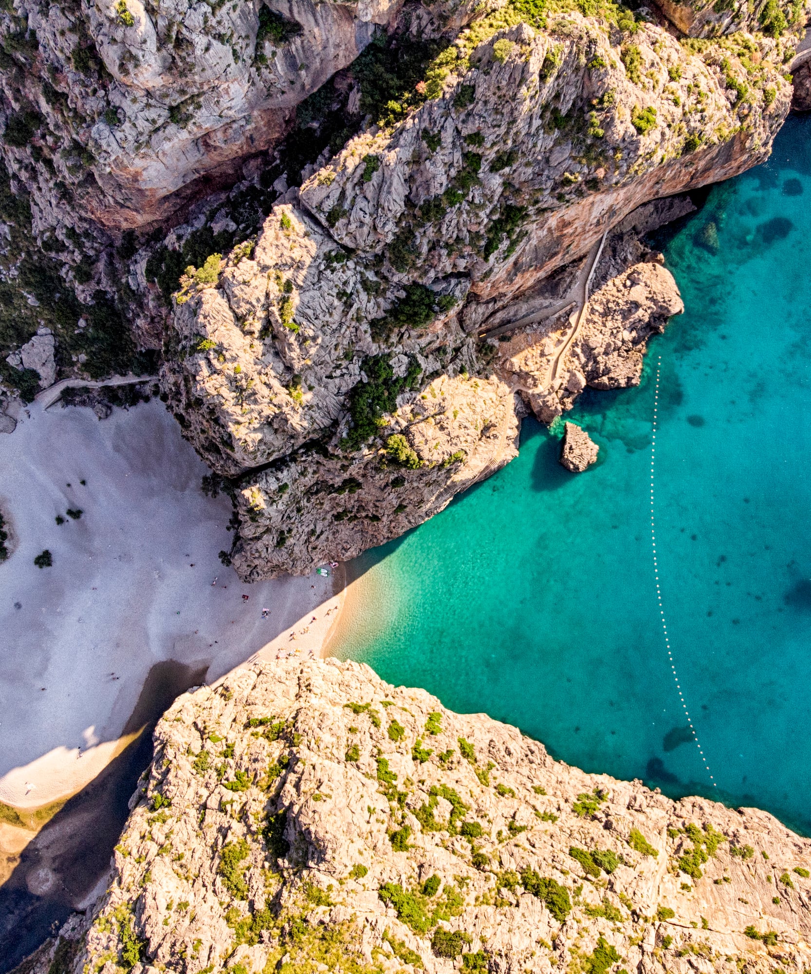 a body of water and rocky cliffs