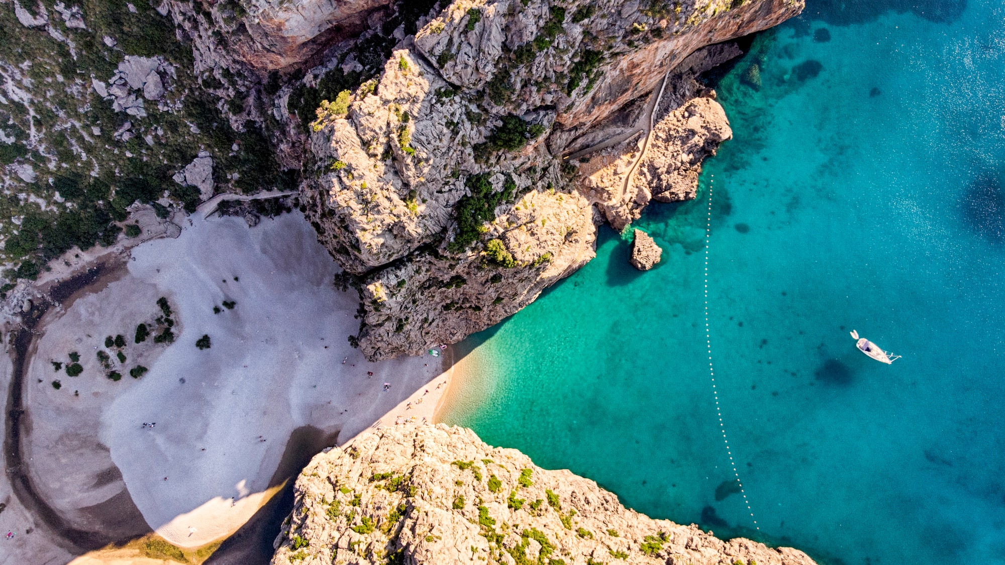 a body of water and rocky cliffs