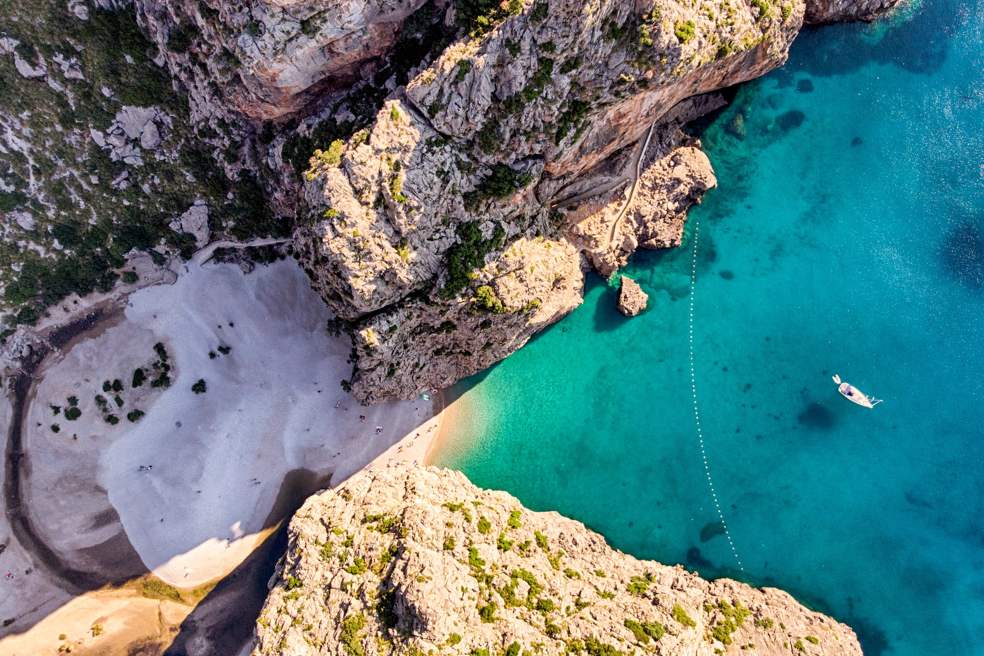 a body of water and rocky cliffs