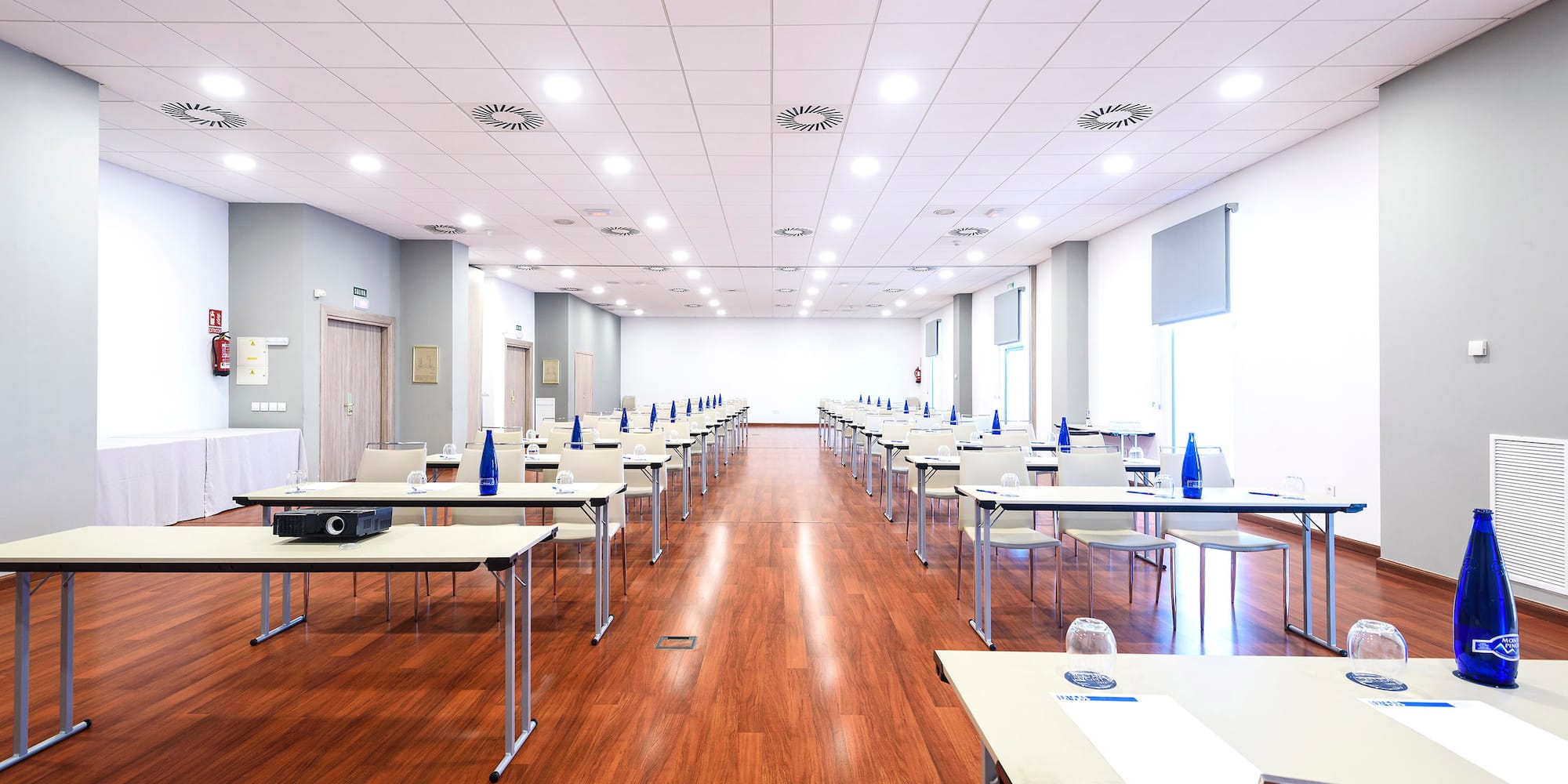 a room with tables and chairs