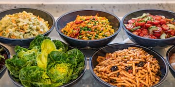 a group of bowls of food