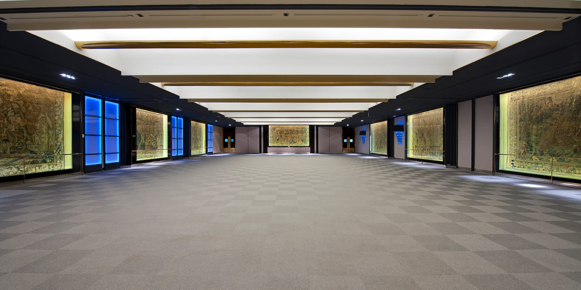 a large room with a blue light