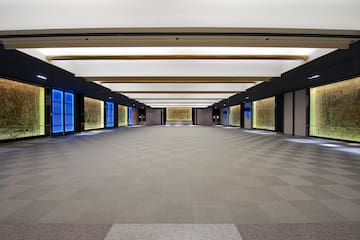 a large room with a blue light