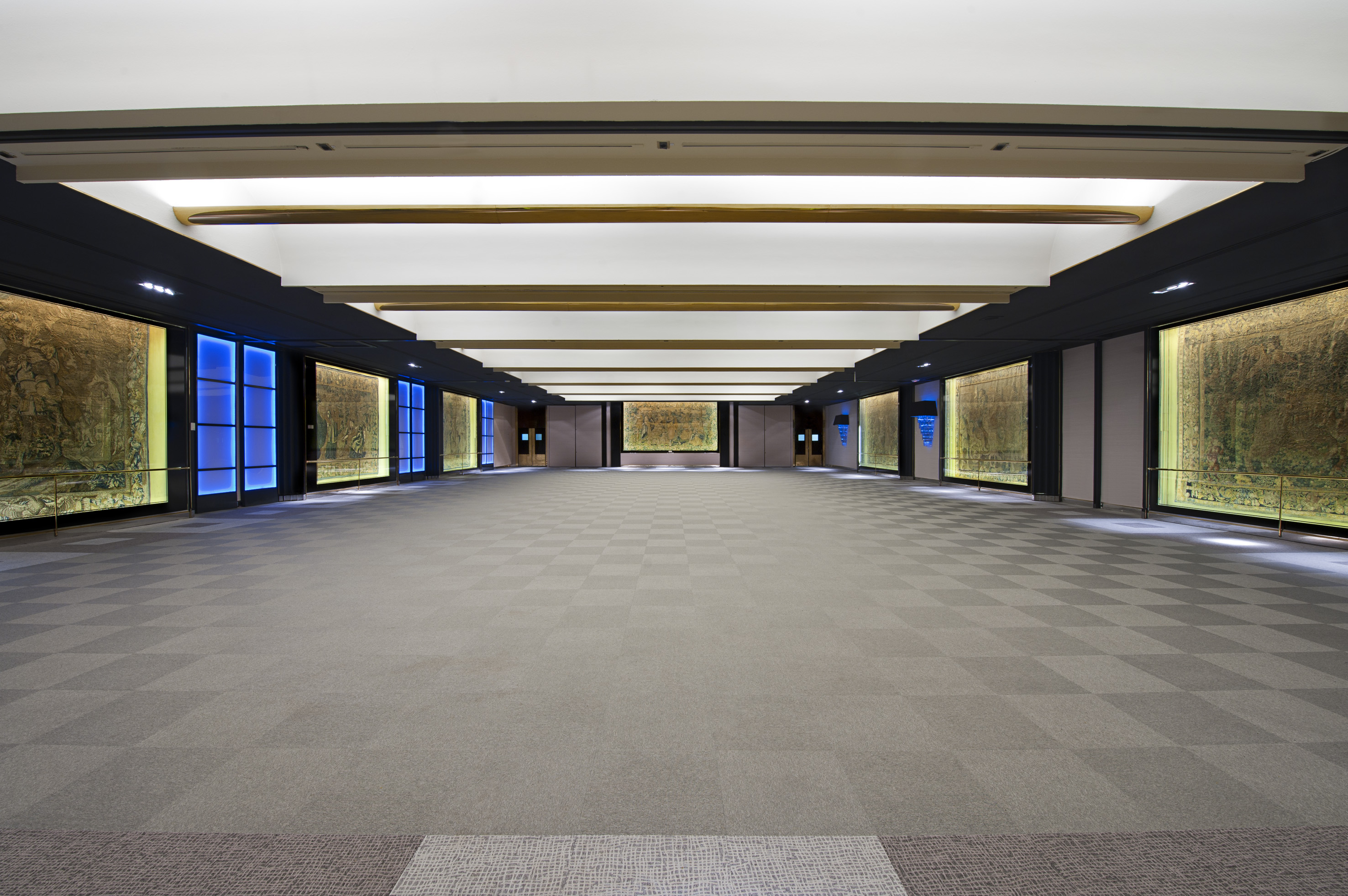 a large room with a blue light