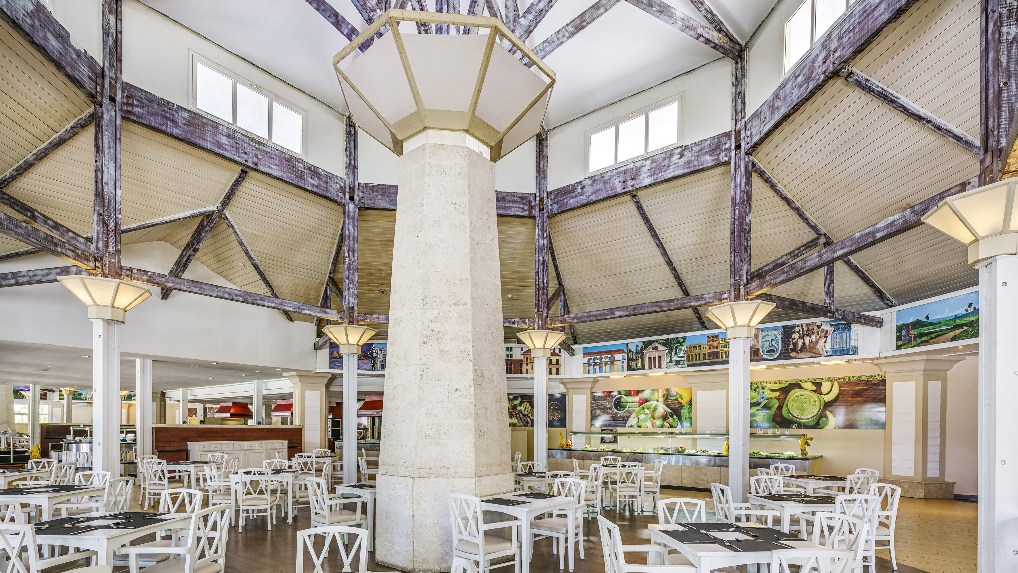 a large room with tables and chairs