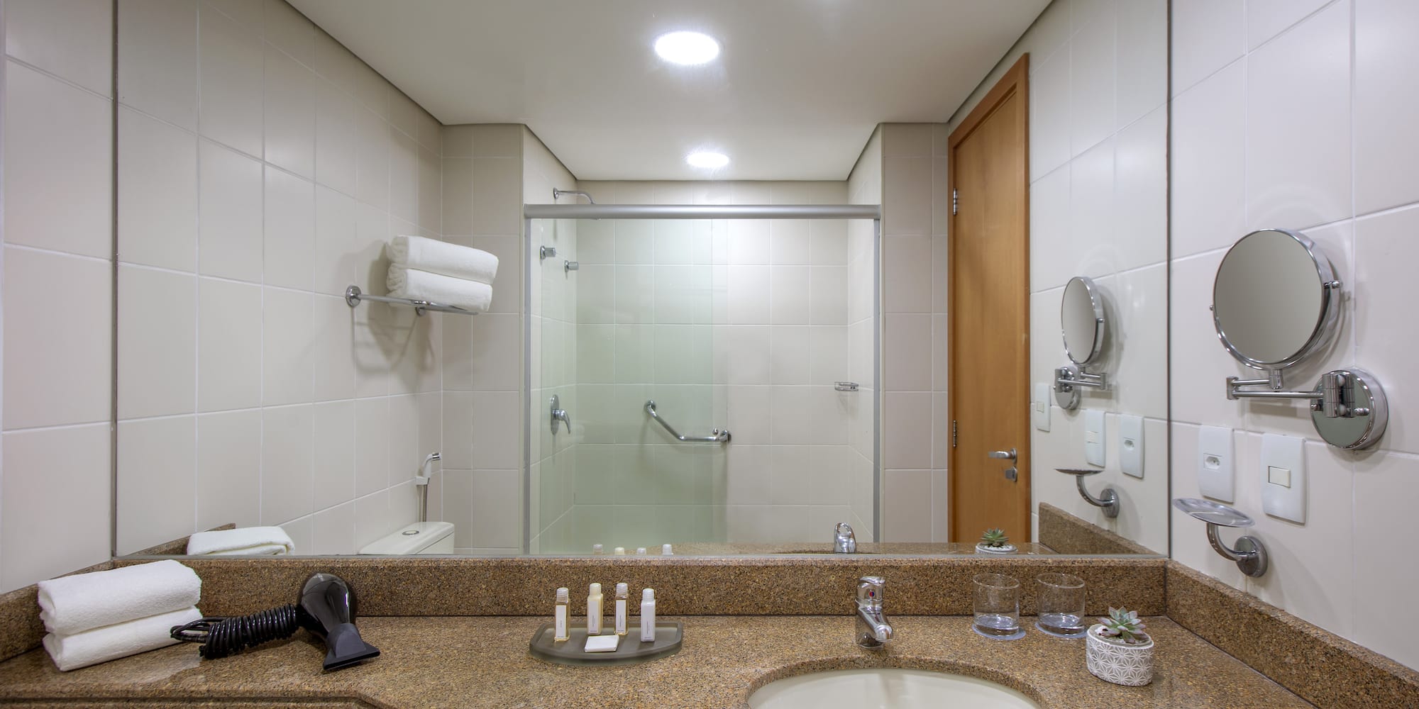 a bathroom with a mirror and sink