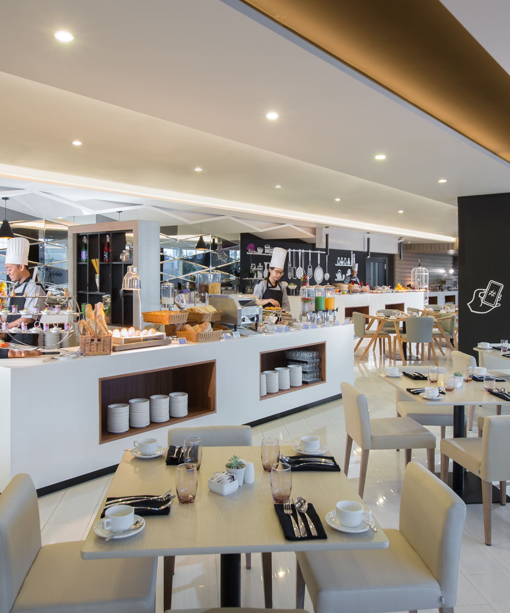 a restaurant with a chef cooking