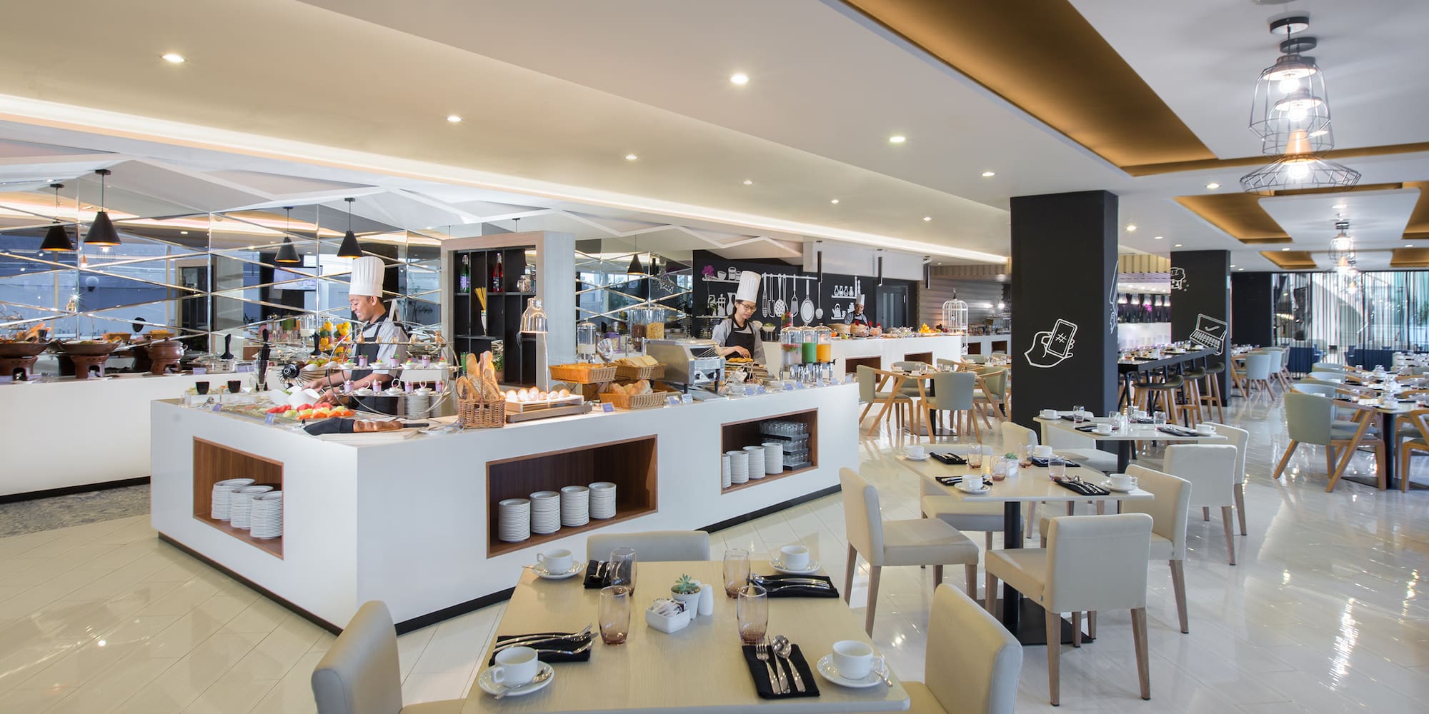 a restaurant with a chef cooking