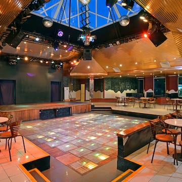 a room with a large floor and a large stage