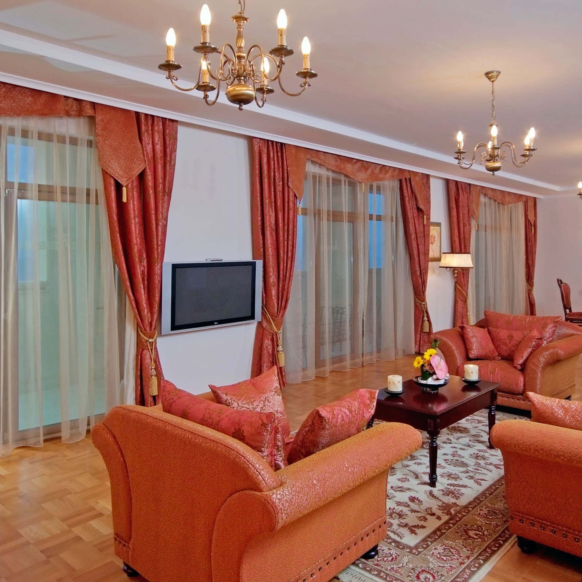 a living room with a couch and a tv