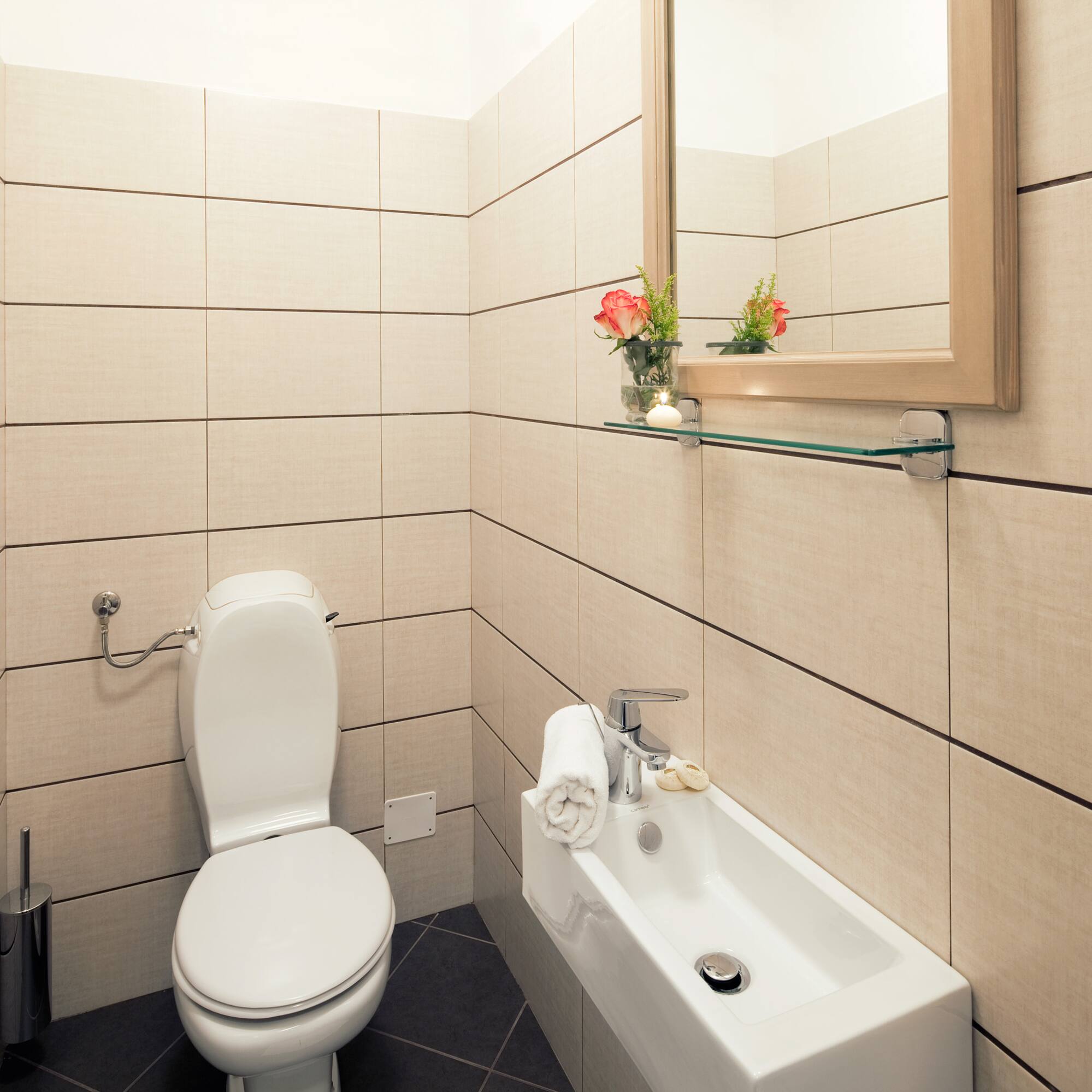 a bathroom with a toilet and sink